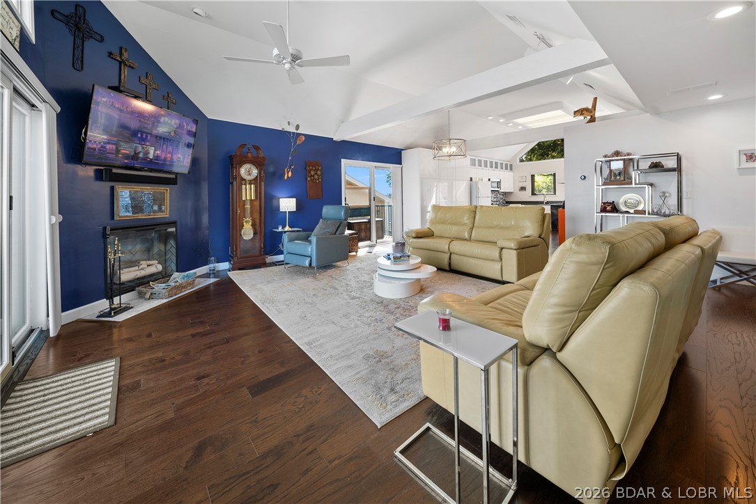 Experience elevated lake living in this beautifully updated condo at The Falls. Offering 3 bedrooms, 2 bathrooms, a detached garage & 1,428 square ft of thoughtfully renovated living space, this property combines modern comfort with stunning lake views. Recent upgrades include a brand new roof completed in September 2025, along with a new front deck & railing. Conveniently located with only 3 steps to the front door, this unit offers easy access while still enjoying the privacy and views of a top-floor condo. A 14x32 boat slip is also included, making it easy to enjoy everything the Lake of the Ozarks has to offer. Inside, the open-concept floor plan  creates the perfect setting for entertaining family and friends. The stylish kitchen features stainless steel appliances, custom cabinetry & an abundance of windows that fill the space with natural light. Step outside to the oversized deck and take in breathtaking lake views while enjoying your morning coffee or relaxing at sunset. Located close to popular waterfront attractions, this condo offers the ideal blend of convenience, comfort, and lakefront lifestyle. Don’t miss your opportunity to own this move-in ready lake retreat!