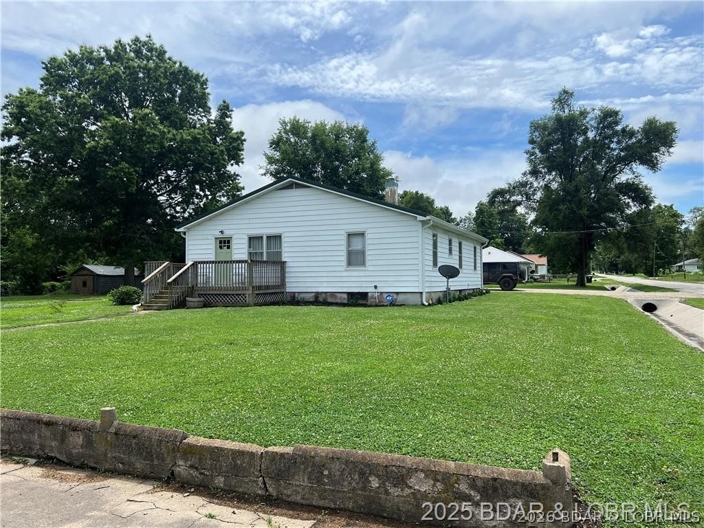 This 3 bdrm 2 bath home has been completely remodeled in 2024 and is move in ready. Has newer appliances, new sewer lines, new flooring in kitchen, hardwood floors throughout, new interior doors, new paint & more. The home sits on 4 city lots ready to entertain the family and friends and has a fenced in area for the pets. Close to all shopping and eateries in the area.