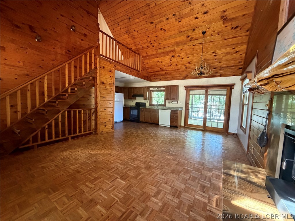 Tucked into one of the most convenient locations at Lake of the Ozarks, this private waterfront cabin delivers something that’s getting harder to find… easy lake living without the chaos.

No long winding roads. Easy access from town. Easy access by water. Easy to load up and enjoy for the weekend or stay all season long. Located near The Cave Bar & Grill and Nauti Fish Rum Bar, you’re close to the action while still having the privacy and feel of a true lake retreat.

Inside, the home offers 1,944 square feet with main level living, vaulted wood ceilings, natural light, and lake views throughout. Outside features include 75’ of waterfront, gentle lot, a 2-slip concrete dock with swim platform, screened porch, detached garage, and multiple spaces built for gathering and relaxing.

The home has the authentic lake cabin feel people want, with the opportunity to make updates over time without stepping into an overwhelming project or price point.

Whether you’re looking for a weekend escape, full-time lake living, or a short-term rental investment opportunity, this property checks boxes that are getting tougher to find at the Lake.