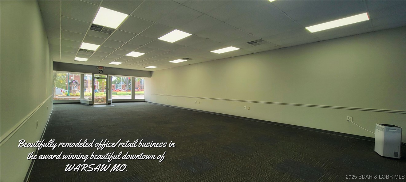 1675 Sq ft in this remodeled property located on main street in the busy Lake of the Ozarks community of Warsaw, MO! Plenty of room in this building for retail or offices. Nicely redone to include 1/2 bath & plenty of storage & shelving. The back room has separate entrance, for a possible sublet. The expansive store front area is set up with high speed fiber optics at several locations. The roof was replaced in 2024, interior & exterior has been recently painted. Newer Zoned HVAC System, flooring & pex plumbing. This building is ready for business! This wonderful community has won several Awards, including Governor's Tourism Award, National Complete Streets Coalition Award, also named "Great Place in Missouri" by the American Planning Association. The building backs up to the historic community building and Drake Harbor, the winner of the 2025 "Best Public Park" award by Heartland Choice Awards. Your business will thrive in this bustling little lake community! Many downtown businesses including restaurants & small boutiques. The many community events brings in thousands of visitors every year. Warsaw, MO is a great place to live & start a new business! Don't let this one get away!