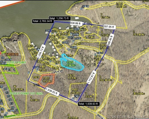 Simple country living can be achieved here with a bonus of an easement to the Lake of the Ozarks!   1.17 acres just off the blacktop road in a very sparse community, this land is pretty gentle with minimal restrictions - minimum square footage is 1000 square feet.  Bring your shouse plans everybody is doing it, also permitted are manufactured or modular homes but any home you build must be on a foundation!  This would be a perfect place to build what you want and live within walking distance to the lake easement.