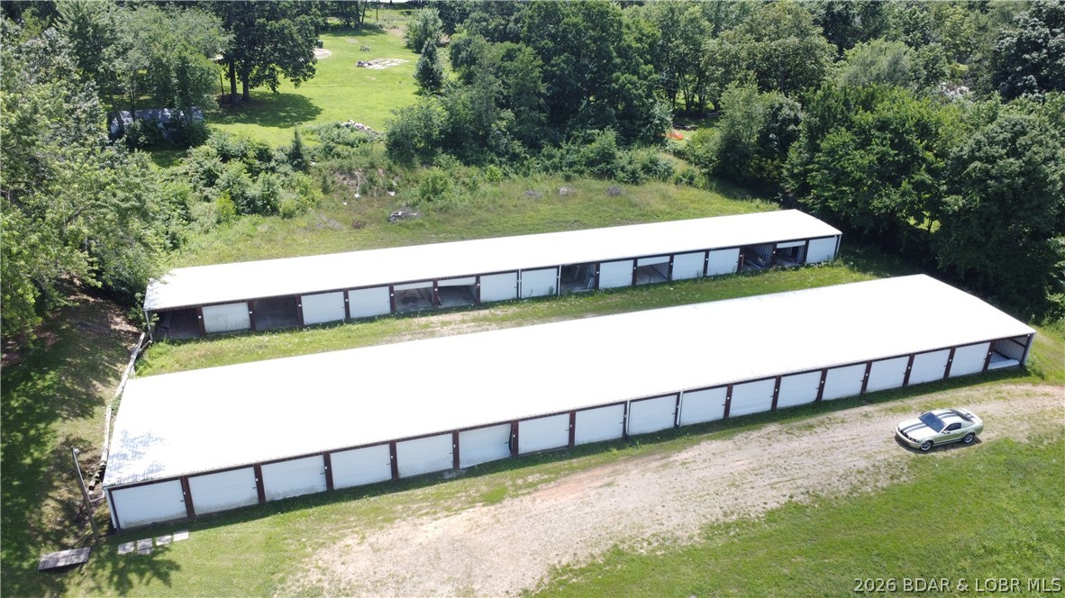 Outstanding value-add investment opportunity in the heart of Stover! This self-storage property offers significant upside potential with 2 storage buildings situated on approximately 1.37 acres.

The property features 34 total storage bays (17 per building) with concrete floors. Unit configurations include primarily 10x30 and 10x20 spaces, with several units divided for added rental flexibility.

The facility is currently underutilized, creating an excellent opportunity for a new owner to improve occupancy, increase revenue, and maximize return. Existing tenants are month-to-month, allowing flexibility for updated lease terms and rental rates.

Utilities include water on site with an existing meter and spicket. Sewer and electric service are nearby for future expansion or upgrades. 

With strong value-add potential, room for operational improvements, and possible expansion opportunities, this property is ideal for investors seeking a storage facility with immediate upside and long-term growth potential.