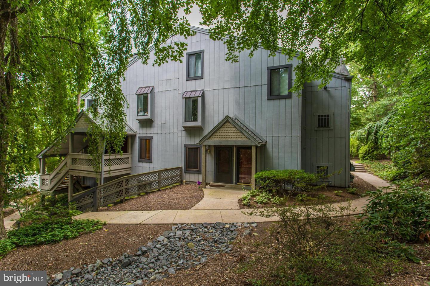 A 10+ beautifully updated one-bedroom condo in the desirable Windbrooke community. Offering a generous 915 square feet of stylish living space on one level. This home features updated  wood flooring throughout living, dinning and bedroom,  beautiful ceramic tile in the kitchen and bathroom, creating a warm and inviting atmosphere. The thoughtful layout provides plenty of room for relaxation and entertaining. This 2nd floor condo unit includes a well-appointed large bathroom and a modern kitchen with updated stainless steel appliances. Full Size Washer and Dryer inside the  unit. Step outside to the spacious deck from the breakfast room to enjoy a serene view of trees and  seasonal plants all year round.  Enjoy the convenience of nearby amenities, parks, restaurants and easy access to Rt.270, Rt.355 and Metro Bus Line. Ideal for those seeking a comfortable, move-in-ready home in a quiet community. Enjoy  an outdoor community pool and plenty of parking.