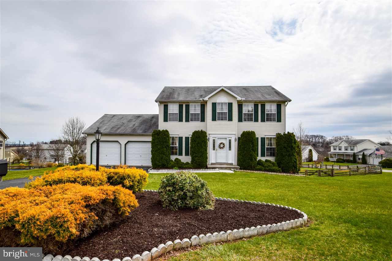 Large, welcoming Colonial on deep corner lot w/ fenced backyard & heated pool ready for summer fun! Beautiful, bright, open floor plan & lots of natural lighting; open Foyer & formal LR & DR; 1st fl Fam Rm w/ gas FP & marble hearth; eat-in Kit w/ island/breakfast bar, bump out dining area & huge deck. 1st fl Lau & generous BRs incl huge MBR w/ sitting area, W-I closet & full BA. Finished W-O LL w/ great Rec Rm, Office & storage. A real gem!