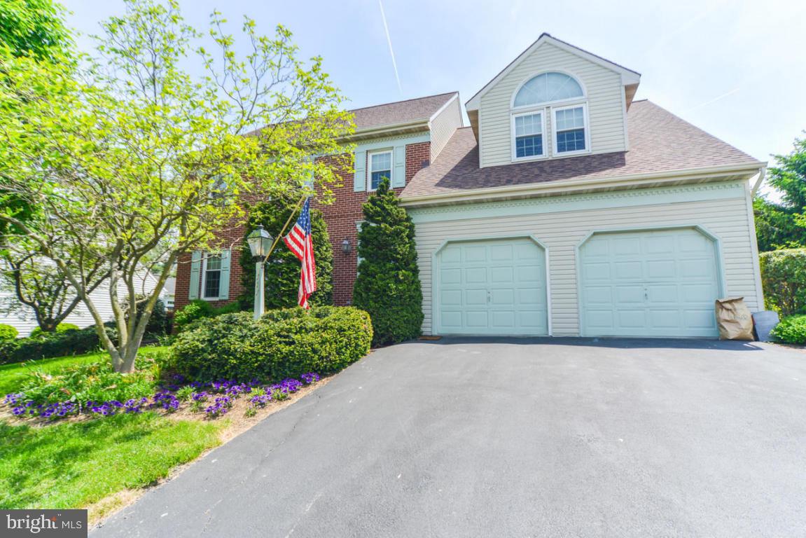 This stunning 4 bedroom, 3.5 bath has been meticulously maintained and upgraded over the years. Oak kitchen with Corian tops, tiled bath with quartz tops, master bedroom with cathedral ceiling, walk-in closet and large bath. Finished basement, screened porch overlooks many colorful plants throughout the yard and irrigation system plus an attached 2 car heated garage.  See attached list for details.