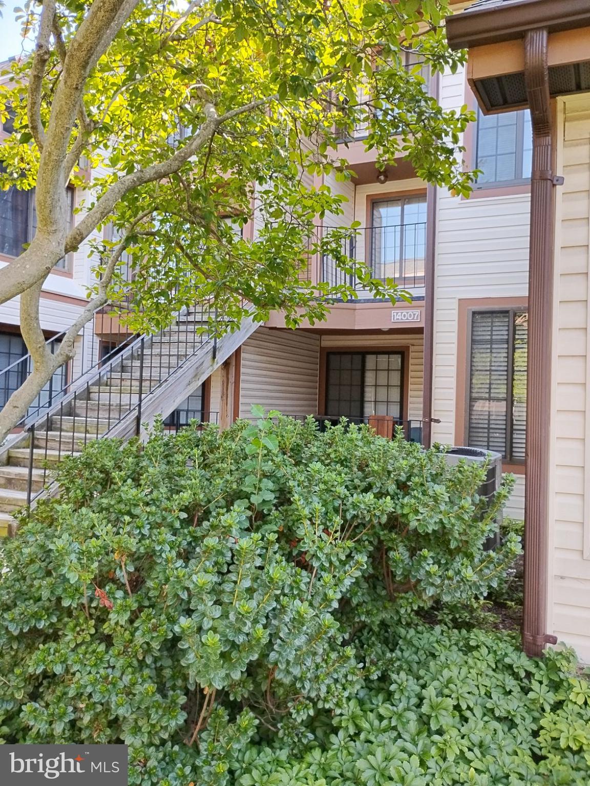 3 percent closing help offered. No FHA offers accepted.  Almost new!! Beautiful and unique 2 bedroom/2 bathroom condo with loft and one-car garage at the Tiers of Laurel Lake community. This bright and open floor plan offers a living room with a 2-story vaulted ceiling, expansive windows, stairs to second-story loft, and gleaming low maintenance vinyl floors which lead out onto a personal balcony overlooking the landscaped courtyard. The large totally updated kitchen with beautiful cabinets, quartz counters, quartz wet bar, stainless steel appliances, a new under water filtration system with separate faucet, and new light fixture opens to an eating area in the living room. Beyond the kitchen is the master bedroom with ensuite bath, second bedroom, hall bath and second entrance hallway with new water heater, HVAC, and stackable washer/dryer. Both baths newly updated with new vanities/faucets, new flooring and custom tiling in tub surround. Recessed lighting to provide extra lighting in kitchen halls and breakfast nooks. Neutral painted and Loft conversion to 3rd bedroom possibilities.