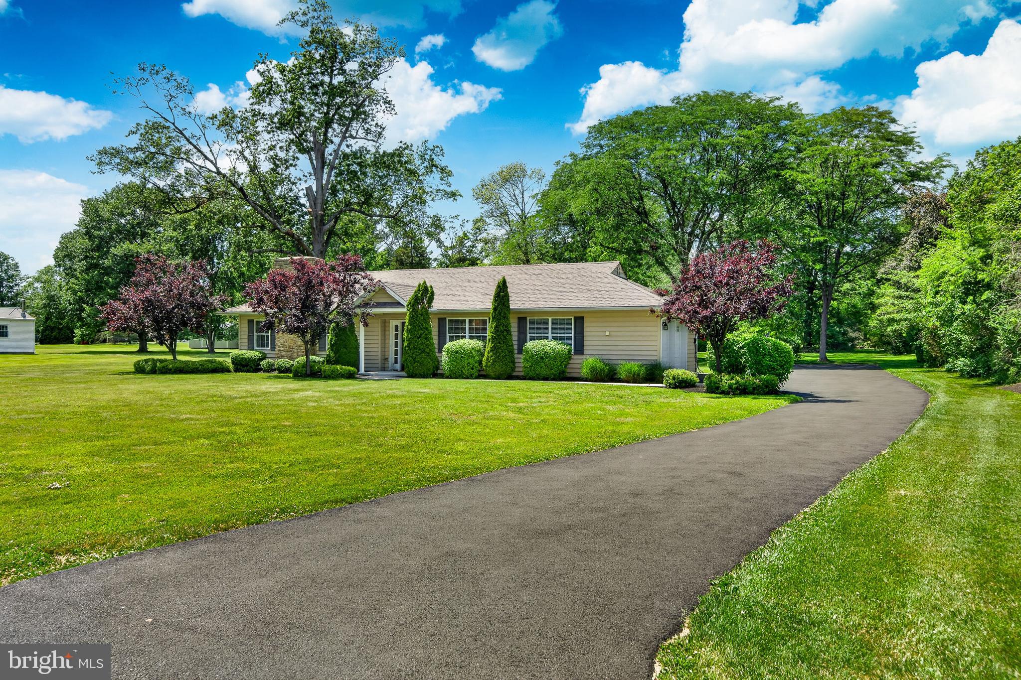 Why settle for a townhome when you can have a .84 acre of your own and a home that's already been beautifully updated from top to bottom?

Welcome to this stunning 3-bedroom, 2-bath ranch in the North Penn School District, offering the convenience of one-floor living without sacrificing space, privacy, or style. Thoughtfully redesigned and extensively upgraded, this home is truly move-in ready. Major improvements completed in 2016 include a new roof, windows, plumbing, HVAC system, R-38 blown insulation, and 200-amp electrical service, giving you peace of mind for years to come.

Step inside and you'll immediately appreciate the open-concept floor plan designed for modern living and effortless entertaining. The spacious living room, dining area, and kitchen are connected by beautiful hand-scraped hardwood floors. A wood-burning fireplace with a striking stone surround creates a warm focal point, while natural light fills the space throughout the day.

The kitchen is the centerpiece of the home, featuring 39-inch cabinetry, granite countertops, a center island, and upgraded slate appliances, including a French-door refrigerator. Whether you're hosting friends or enjoying a quiet evening at home, this space was designed to bring people together.

French doors off the dining area lead to a patio overlooking the expansive .84-acre lot—a rare find in today's market. There's room for pets to roam, kids to play, gardens to grow, and outdoor gatherings of any size.

The primary suite offers a beautifully renovated tile bath with double vanity and walk-in shower, along with two closets for ample storage. Two additional bedrooms provide flexibility for family, guests, or a home office. A partially floored attic, attached storage sheds, and a two-car garage ensure there's plenty of room for all your belongings.

If you've been considering a townhome, take a look at what this property offers instead: no shared walls, no cramped outdoor space, no feeling boxed in. Just a beautifully updated home, a large private yard, and the freedom that comes with owning your own piece of land.

Move right in, unpack, and start enjoying the lifestyle you've been looking for.