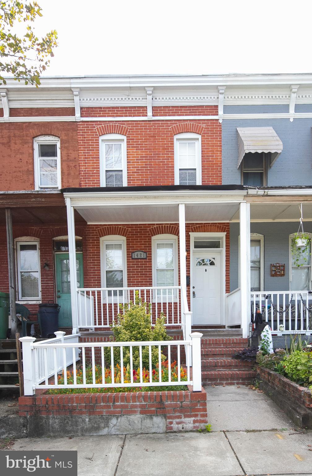 Beautifully renovated rowhome just blocks from all the action and walking distance to downtown. Enjoy open floor plan, wood floors, stunning kitchen w/ stainless steel appliances & granite counters, designer bath w/ceramic tile, updated ceiling w/exposed brick and more. Front yard space is perfect for small herb or flower garden.