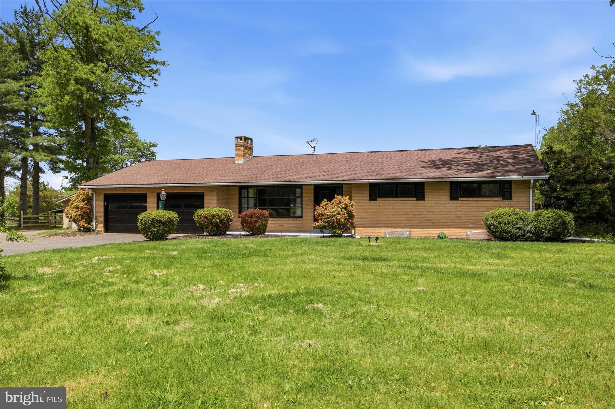 Welcome to your own private retreat — where country living meets everyday convenience. This custom-built, one-story ranch on 3+ sprawling acres is the mini-farm lifestyle you've been dreaming of.

Step inside and discover 2,000 sq ft of above-grade living space with 3 bedrooms, 2 full and 1 half baths, and a living room anchored by a brick fireplace. The kitchen features Corian countertops and a large center island — perfect for gathering - leads to a large, window-lined Florida room/enclosed patio with a bar and pool table — both included — overlooking the private backyard oasis. The finished lower level offers two separate spaces: a bonus room ideal as a 4th bedroom or home office, plus a dedicated workshop room.

Outside is where this property truly shines. A freshly painted exterior, updated in-ground Anthony pool, and newly rebuilt board fence frame 3+ acres of open countryside. The 24'x36' barn features one horse stall, plus ample space for equipment, a workshop, or hobby use — a true mini-farm gem, perfect for equestrian enthusiasts or those who simply want room to breathe.

Private well and septic. Hot water baseboard heat. Located on a quiet country road just minutes to shopping, dining, Route 313, and a 5-minute drive to Nockamixon State Park's 5,283 acres of outdoor paradise. Quakertown Community School District.

This is the one. Come experience it.