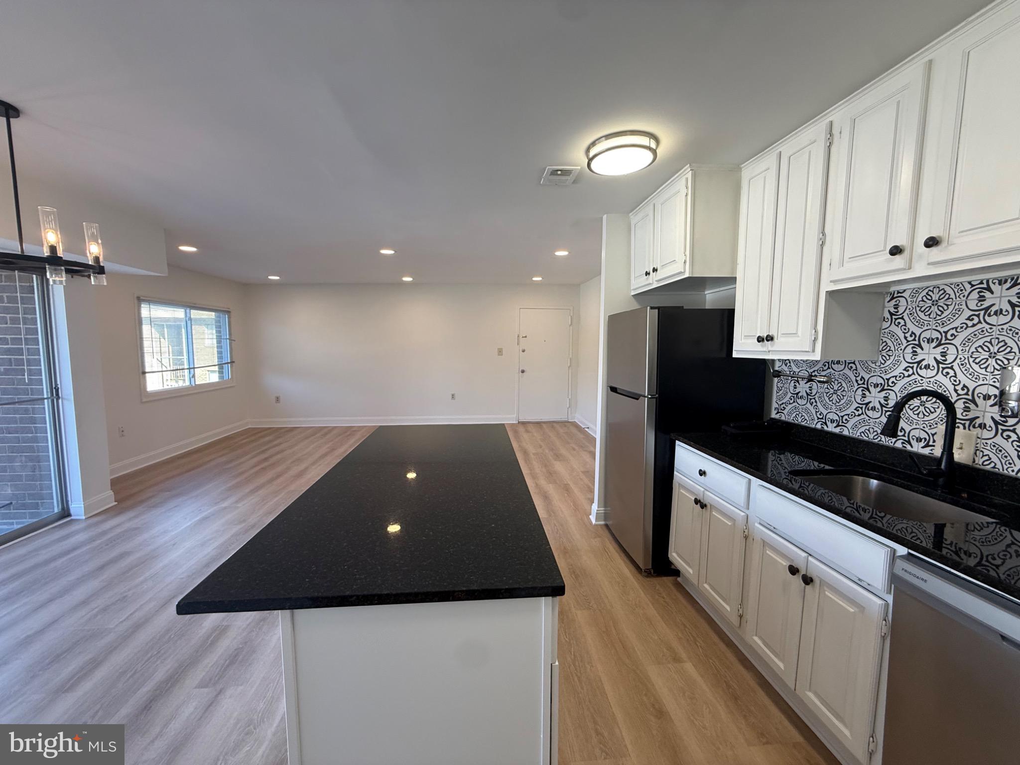 Discover the charm of this inviting Top level unit . This well-maintained apartment, offers a cozy living space. Perfect for those seeking comfort and convenience. Enjoy the ease of included utilities and private parking, allowing you to focus on what truly matters-making this space your own. This unit is moving ready & Available Now! You can apply online, Two year lease are welcome. Conveniently located near public transportation and shopping areas. Don't miss out on this opportunity to make this delightful space your new home!