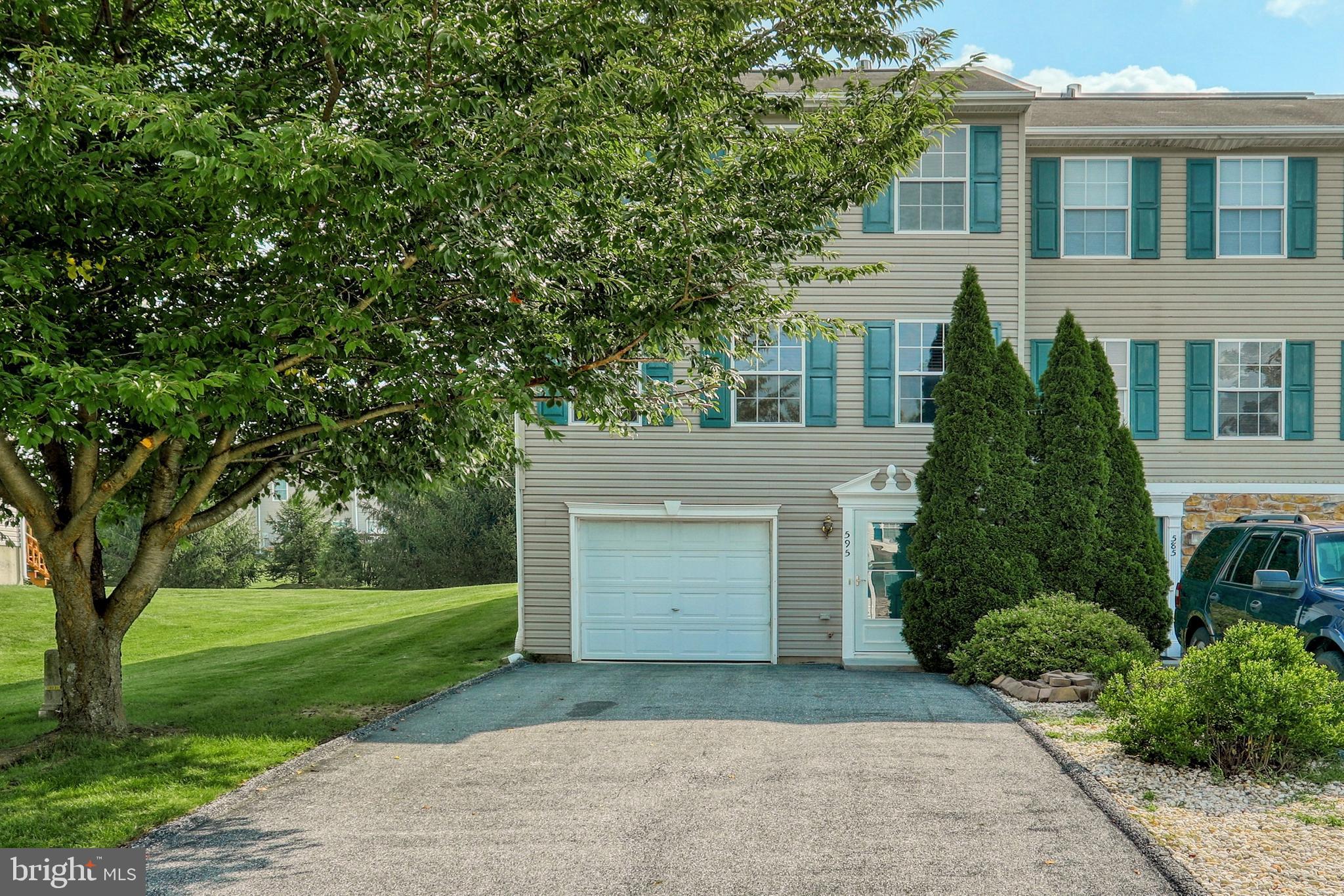Move in ready 3br end unit townhouse, popular Buttonwood Crossing!   New storm door, recent paint & flooring. Garage and family room plus .5 bath on lower level, main floor offers living room, eat in kitchen plus laundry and additional .5 bath & 3 bedrooms w/  full bath up.  A lot of house for the $$! Affordable hoa fee at $40/month covers grass and snow removal.  Super convenient to Rt 30, easy commute to York or Lancaster.  All blinds, appliances and 1 year Cinch home warranty included.  Deck overlooks common area and easy walk to the park!  Easy to show, better hurry....