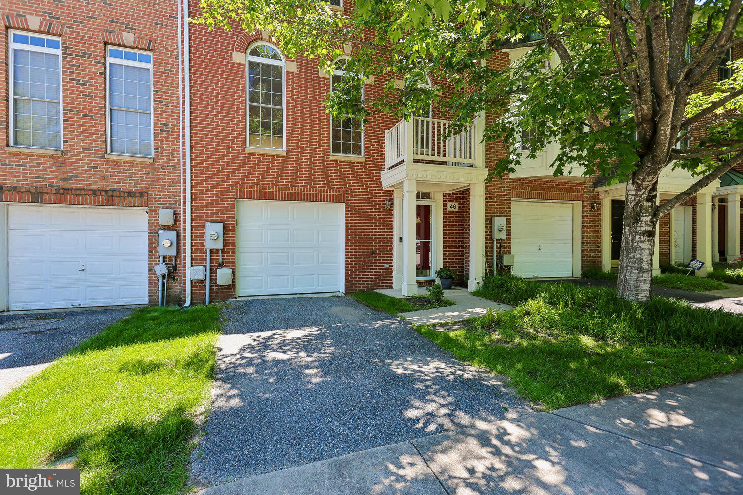 OFFERS  DUE TUESDAY JUNE  9. BY.  5 PM..Welcome home to this spacious and sun-filled three-level townhouse featuring 3 bedrooms, 3.5 baths, and a one-car garage equipped with an electric vehicle charging station. From the impressive two-story foyer to the expansive living spaces throughout, this home offers comfort, style, and functionality at every turn.  Meticulously maintained by the current owners, the home showcases numerous recent improvements, including a new HVAC system (2023), new  insulated garage door, new luxury vinyl plank flooring on the main level, French Door Refrig (2023), Dishwasher (2024), recessed lighting throughout, and all interior doors have been updated with tasteful new hardware throughout the home.  The open-concept main level is perfect for everyday living and entertaining. The chef-inspired kitchen features white cabinetry, stainless steel appliances, a gas cooktop (2020), center island with breakfast bar, abundant storage, and a spacious table area for casual dining. Step directly from the kitchen onto the newly resurfaced deck, providing the perfect outdoor retreat for relaxing or entertaining guests.  The elegant living and dining room boasts soaring 10-foot ceilings, crown molding, recessed lighting, and beautiful Palladian windows that fill the space with natural light.  Upstairs, the spacious primary suite offers a walk-in closet and a private spa-like bath featuring a soaking tub,  walk-in shower, and double sink vanity. Two additional generously sized bedrooms, a full hall bath with a convenient linen closet and full sized washer and dryer complete the upper level.  The walkout lower level features an impressive family/recreation room with dramatic 18-foot ceilings, access to the backyard, and a third full bathroom, making it an ideal space for guests, a home office, or additional living and entertainment needs.    Conveniently located near Dogwood Park with tennis courts, playgrounds, and sports fields.   This elegant home is also just minutes from Rockville Town Center's shopping, dining, and entertainment. The Rockville Metro is approximately one mile away, and easy access to I-270 and I-495 makes commuting a breeze.  Don't miss this exceptional opportunity to own a beautifully updated and spacious home in a prime location. This is one you won't want to miss!