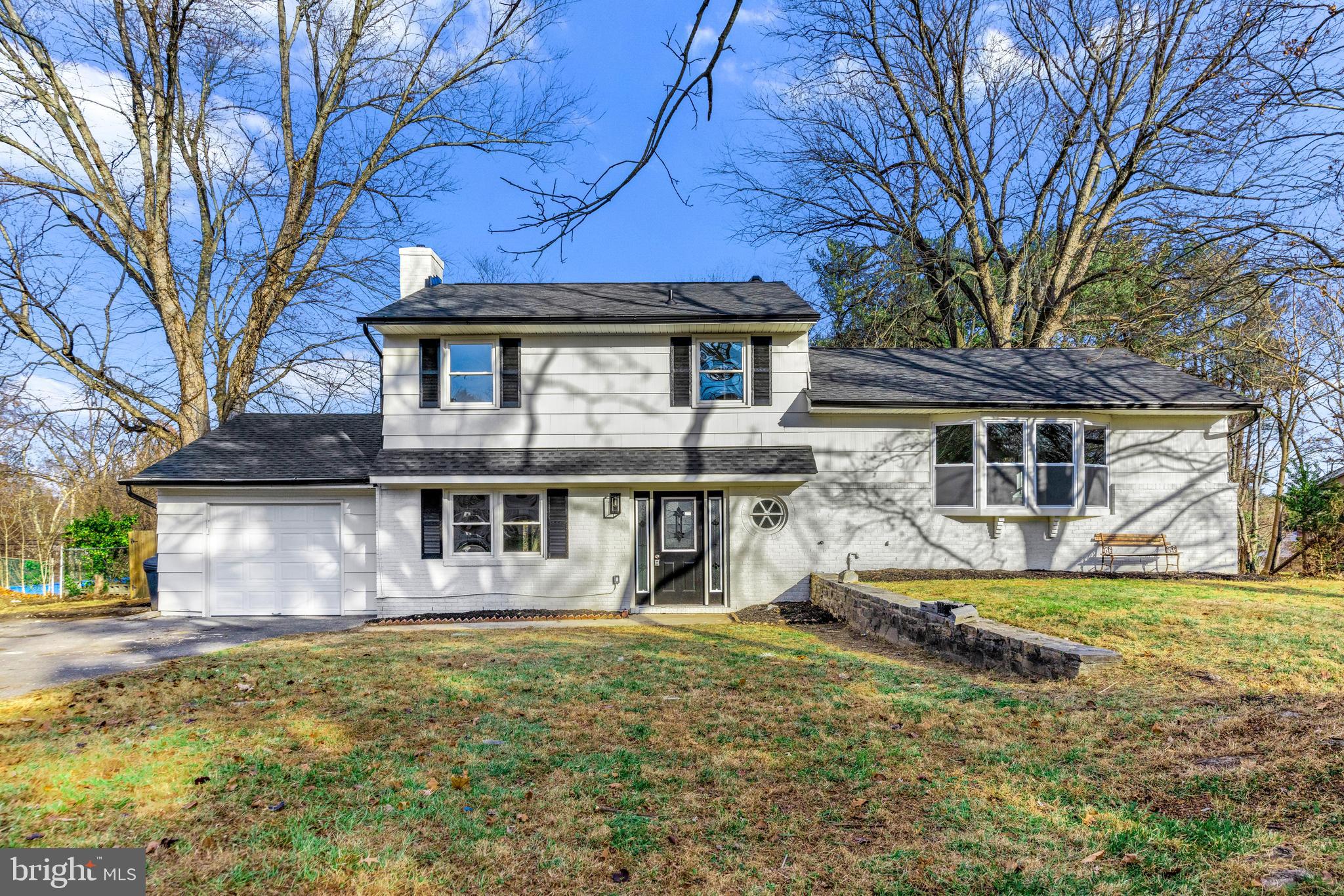 Welcome to 4633 S Leisure Court — a beautifully renovated split-level home offering modern style, generous living space, and a peaceful setting on nearly half an acre in Ellicott City. Completely reimagined in 2025, this 4-bedroom, 2.5-bath residence provides over 2,400 sq ft of finished living area across three thoughtfully designed levels.

The main level features an expansive open-concept layout with wide-plank flooring, recessed lighting, and oversized windows that fill the home with natural light. The spacious living room includes a stylish fireplace accent wall, while the adjacent dining area offers seamless flow for entertaining.

The stunning new kitchen showcases quartz countertops, custom white cabinetry, stainless steel appliances, a gas range, and a large center island—perfect for everyday cooking and gathering. French doors provide easy access to the backyard and outdoor living space.

Upstairs, you’ll find three bright bedrooms and a beautifully updated full bath. The private lower-level suite includes an additional bedroom, full bath, and a large family room ideal for media, play, or guest accommodations. A dedicated laundry area and access to the attached garage add convenience.

The exterior features a covered front porch, newly refinished patio, and a spacious, level backyard that backs to trees—an excellent space for relaxation, gardening, or outdoor entertaining. The attached garage and wide driveway offer ample parking options.

Additional highlights include central A/C, updated natural gas heating, fully finished lower level, and extensive cosmetic and functional improvements throughout the home.

Located just minutes from major commuter routes, dining, shopping, and top-rated Howard County amenities, this move-in-ready home combines modern upgrades with suburban comfort in an ideal location.