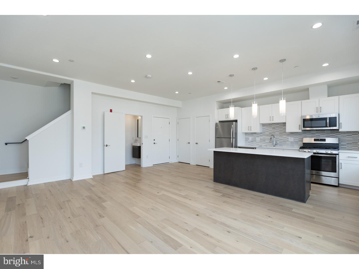 Amazing opportunity to be the first to live in this luxurious apartment in ultra desirable Fishtown / East Kensington. This unit features 2 bedrooms & 1.5 baths, and private roof deck(!) with amazing panoramic views of the city skyline and surrounding neighborhood.  OPen and light filled kitchen with shaker-style cabinetry, quartz counter-tops, and stainless steel appliances. A walker's paradise and extremely bike friendly yet located close to major roadways and public transportation. Conveniently located near the perpetually hip Frankford Ave corridor as well as popular neighborhood establishments such as Memphis Taproom, Loco Pez, Philadelphia Brewing Co, Martha and much more. Make your visit today!