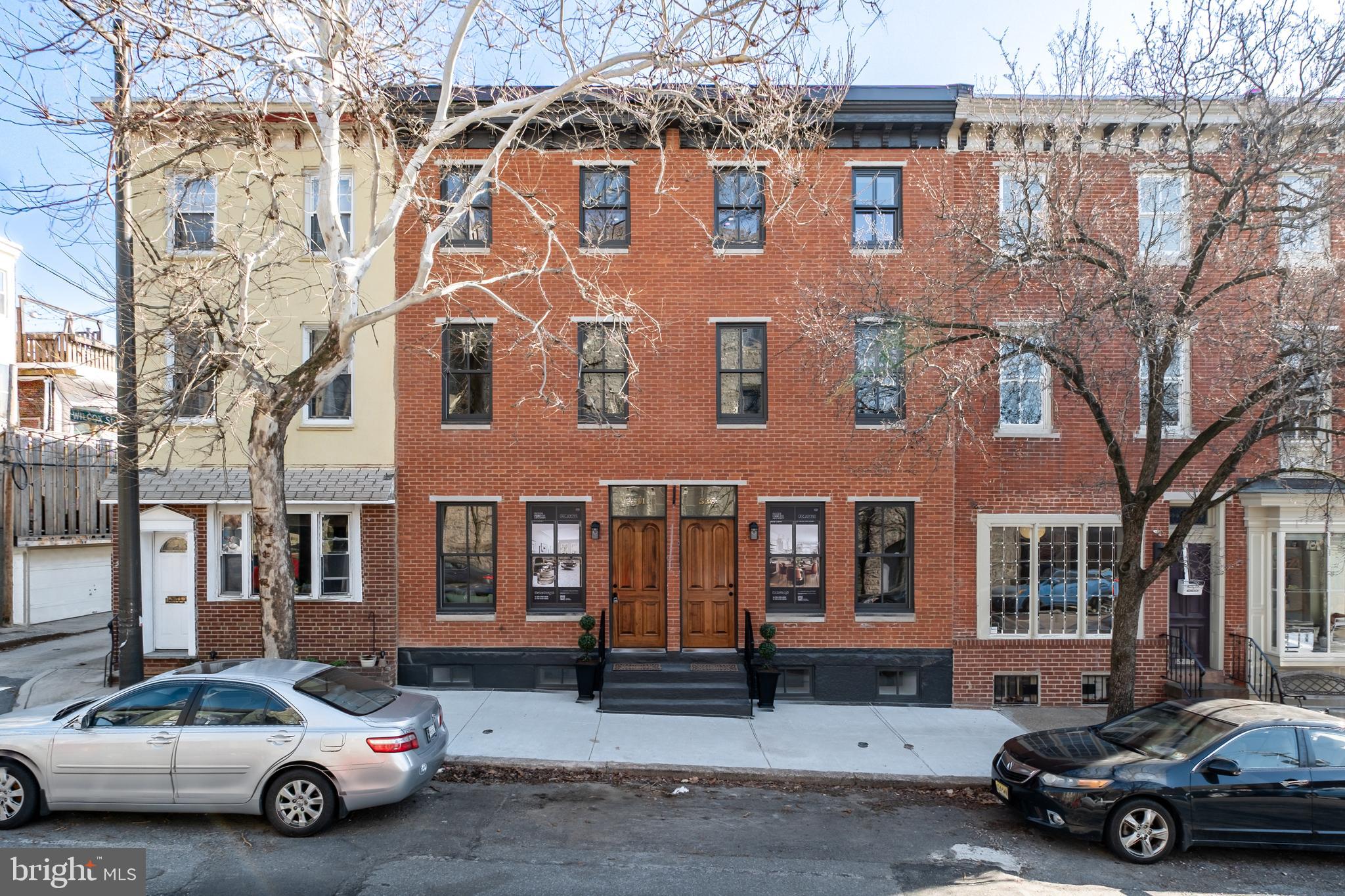 Introducing two newly developed townhomes located in the highly sought-after Fairmount | Art Museum neighborhood of Center City, Philadelphia. Spanning approximately 3,000 sq. ft., each home boasts 4-bedrooms, 3.5-bathrooms, a finished basement, and multiple outdoor spaces. Upon entering, one is greeted by a bright and airy open living space with oversized historic windows that flood the room with natural light. 10-foot ceilings, and wide plank hardwood flooring lead you directly into the dining and kitchen area. A custom fabricated kitchen plan; complete with off-white and walnut soft closing cabinetry, Bosch appliance package, Calacatta gold quartz countertops and backsplash, and polished nickel hardware. To the rear is a perfectly positioned powder room, a closet or pantry space for storage and a private and well-lit yard. Up the stairs, the second floor is where you will find two generously sized bedrooms, two full bathrooms, and a laundry area. Ascending to the third floor is home to the primary suite with a walk-in closet and extra-large en-suite bath with a standing shower and double vanity sink. A custom built wet bar with storage and a mini refrigerator separates the space between this room and the fourth bedroom. Each home is complete with an approximately 800 sq. ft. roof deck with impressive views of the City’s skyline. Additionally, these homes have a full basement with high ceilings, LED lighting, and porcelain tile floors that create tremendous versatility for a den area, children’s playroom, and fitness area. Convenience is key, as these homes are located on a beautiful tree-lined block a short distance from Whole Foods, an array of neighborhood shops, restaurants, museums, parks, and schools. Please note, a 1-year pre-paid gated parking space will be included with an acceptable offer. A newly established 10 year tax abatement will be provided upon settlement of each property.  This property benefit a 1 year full Builder's Warranty.