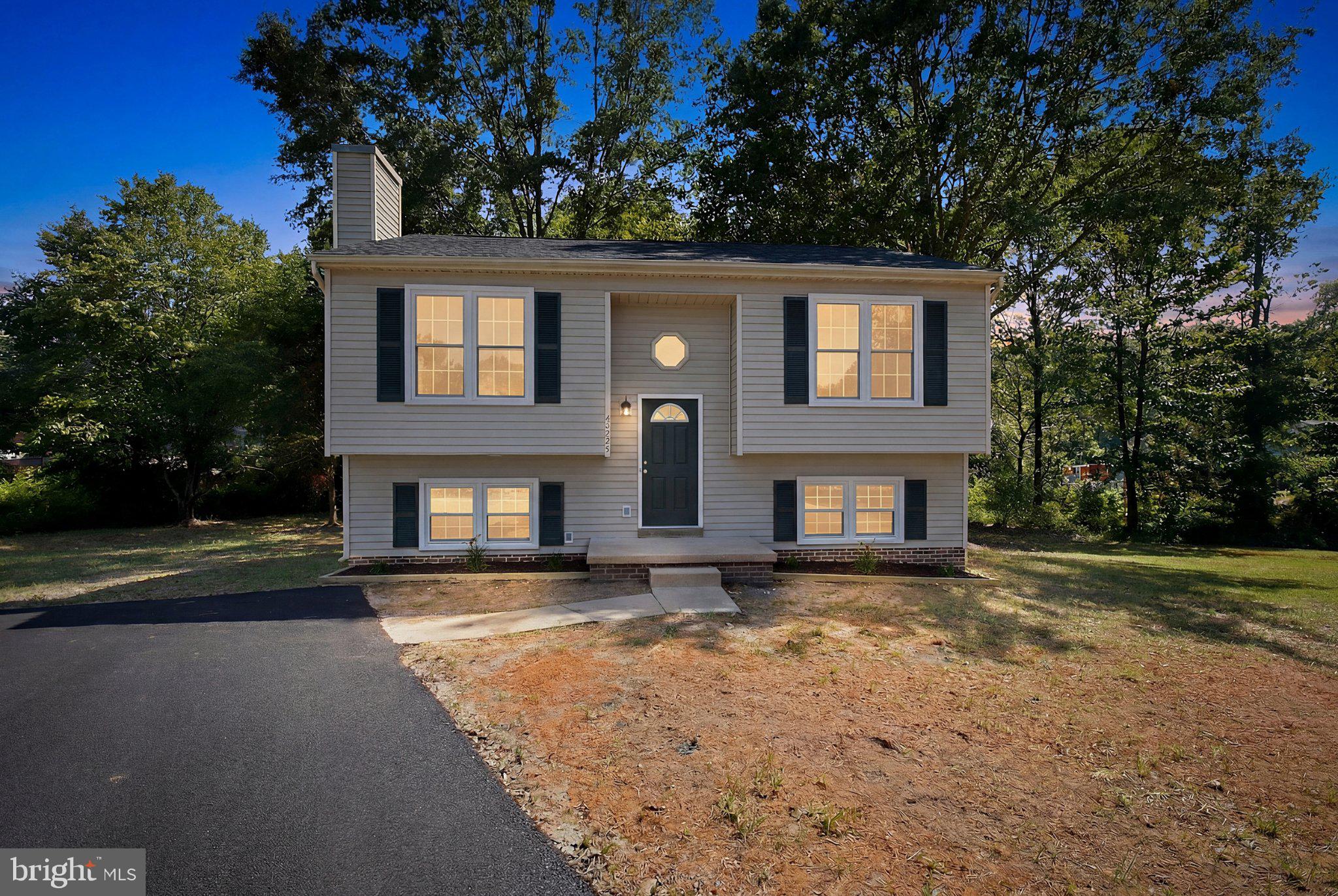 Completely renovated and move-in ready! This beautifully updated split-foyer home offers the perfect blend of modern style, comfort, and privacy on a spacious 0.94-acre lot in the desirable Raintree community. Every detail has been thoughtfully refreshed, allowing you to simply unpack and enjoy. New paved driveway scheduled for next week! 

The bright, open-concept main level features luxury vinyl plank flooring, fresh neutral paint, updated lighting, and a stunning floor-to-ceiling stone fireplace that creates a warm and inviting focal point. The brand-new kitchen boasts white shaker cabinets, marble-look countertops, stainless steel appliances, and plenty of cabinet and prep space, making it ideal for both everyday living and entertaining.

The home offers 4 spacious bedrooms and 2 fully updated bathrooms, including a private primary suite. Stylish finishes, modern fixtures, and quality craftsmanship continue throughout the home, creating a fresh and cohesive feel from room to room.

Step outside onto the newly constructed rear deck overlooking a peaceful, tree-lined backyard with plenty of space to relax, entertain, or enjoy nature. The nearly one-acre lot provides privacy while still being conveniently located near shopping, dining, schools, parks, and major commuter routes.

Additional updates include a new roof, new driveway, fresh landscaping, updated flooring, paint, lighting, fixtures, and more, making this home truly turnkey.

If you've been searching for a beautifully renovated home with modern finishes, generous outdoor space, and a convenient Fredericksburg location, this is one you won't want to miss.

Schedule your private tour today and discover everything this exceptional home has to offer!