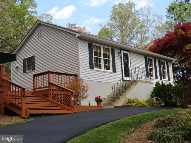 Immaculate 3 bedroom, 2 bath raised rambler on Corner lot. Walking distance to the Chesapeake Bay. Finished basement with wet bar.Large Deck for entertaining. New Roof,New Heat Pump, New Carpet. Nothing to do but unpack and make it yours.