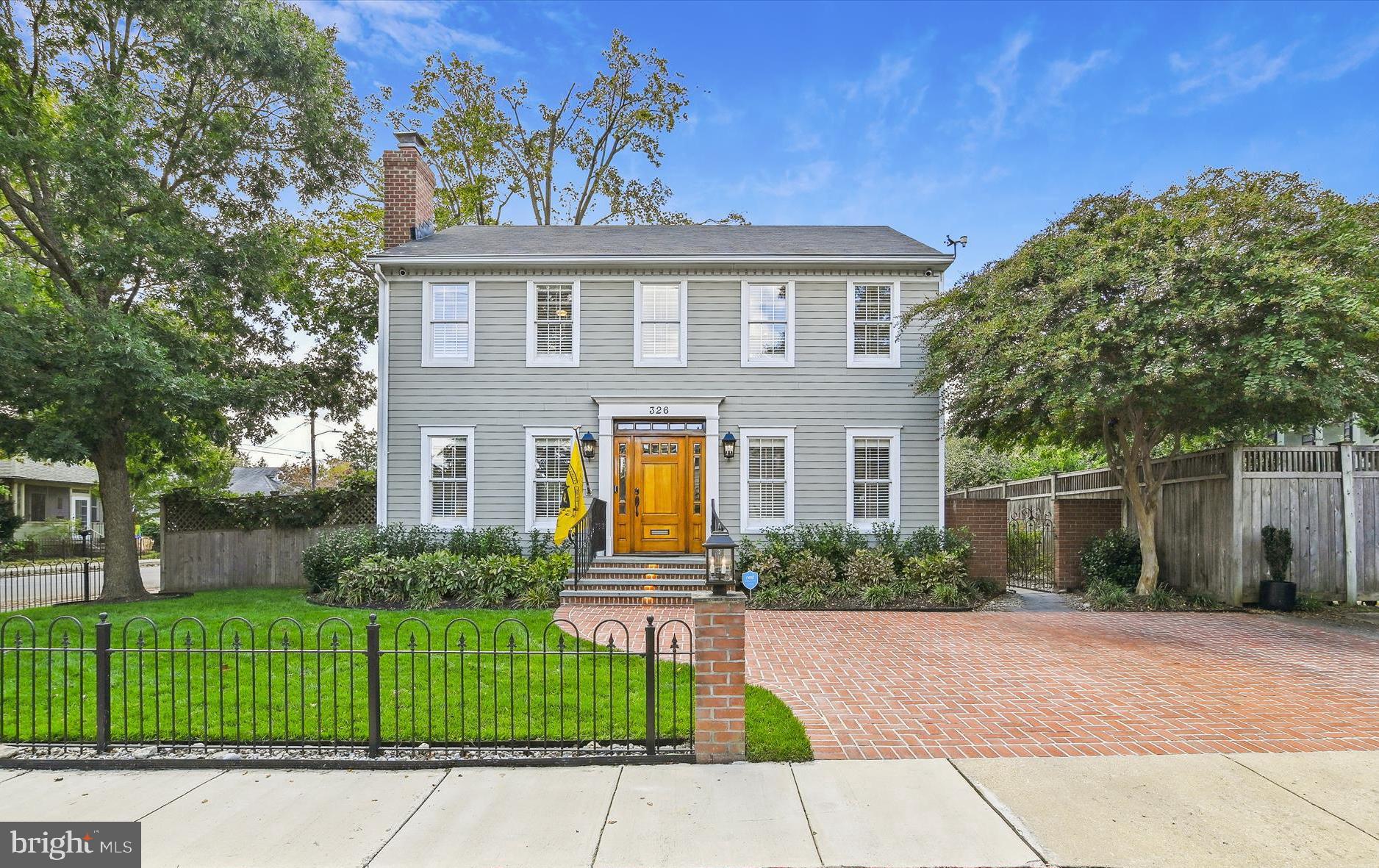 Move-in-ready colonial in the heart of Eastport! This captivating home includes 3 bedrooms, 3.5 baths, and over 2100 sq. ft. of meticulously finished living space, all situated on a generous corner lot with a two-car parking pad. Indulge in the seamless blend of classic charm and modern luxury throughout this newly renovated home (See List of Improvements in Documents). Enjoy the perfect location just one block from the Annapolis Yacht Club and nearby restaurants and shopping; this residence offers unparalleled convenience. Step inside to discover stunning maple hardwood floors, custom crown molding, a gourmet kitchen adorned with quartz countertops, high-end stainless steel appliances, and a breakfast bar with seating for three. The living room features a beautiful wood-burning brick fireplace, custom built-ins, and large double doors that open to an expansive brick and stone patio and garden. The fully fenced yard with mature trees ensures privacy. The perfect place to entertain and the envy of the neighborhood! All four bathrooms have been tastefully renovated with designer tiles and each of the three bedrooms boasts custom closets. The finished lower level includes a full bathroom, a surround-sound speaker system, and a surprise hideaway through a secret door leading to a custom speak-easy lounge. A screened-in porch, connected to the kitchen, provides the ideal space for al fresco dining and entertaining. Stroll the artful and nautical streets to five-star restaurants, pubs and street-end parks. You'll find yourself merely steps away from downtown Annapolis and Naval Academy. Annapolis offers the perfect balance of small-town charm and big world sophistication. Located just 5 miles to Rt. 50 and 97 which provides direct access to Baltimore, BWI, Ft. Meade/NSA and Washington, DC. Welcome Home!