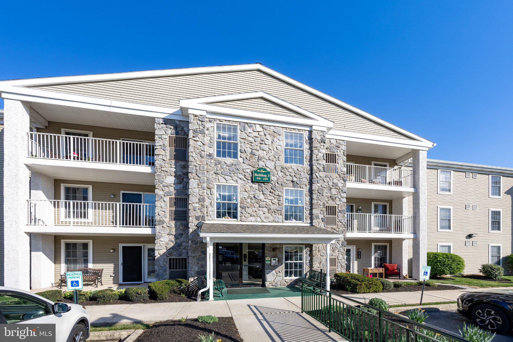 Just listed 331 Brandon Road, located at the coveted Greens at Westover. This is a 55+ active adult community located in West Norriton Township.  With a generous 1,271 square feet of thoughtfully designed living space, this home combines comfort and elegance, making it the perfect retreat. Step inside to discover a warm and inviting interior featuring plush carpeting and sleek laminated flooring that seamlessly blend style and functionality. The heart of the home is the eat-in kitchen, complete with a butler's pantry, ideal for entertaining or enjoying quiet meals. The primary bath offers a serene escape, designed for relaxation and rejuvenation. This unit, located in a charming garden-style building, boasts a private balcony where you can savor your morning coffee or unwind with a good book while enjoying the peaceful street view. The community itself is a haven of tranquility, adjoined by a picturesque golf course, providing a scenic backdrop for leisurely strolls or afternoon rounds. The exterior of the property is equally impressive, featuring well-maintained sidewalks that invite you to explore the beautifully landscaped grounds. Residents can take advantage of the community amenities, including a clubhouse and a sparkling swimming pool, perfect for social gatherings or simply soaking up the sun. For added convenience, this home includes essential appliances such as a dishwasher and disposal, along with main floor laundry hookups. Security features like an intercom system and a main entrance lock ensure peace of mind, allowing you to fully enjoy your surroundings. The association fee covers a range of services, including common area maintenance, lawn care, and snow removal, allowing you to focus on what truly matters-living your best life. Experience the exclusive lifestyle that the Greens at Westover offers, where luxury meets leisure in a vibrant community setting. This is more than just a home; it's a lifestyle waiting to be embraced.