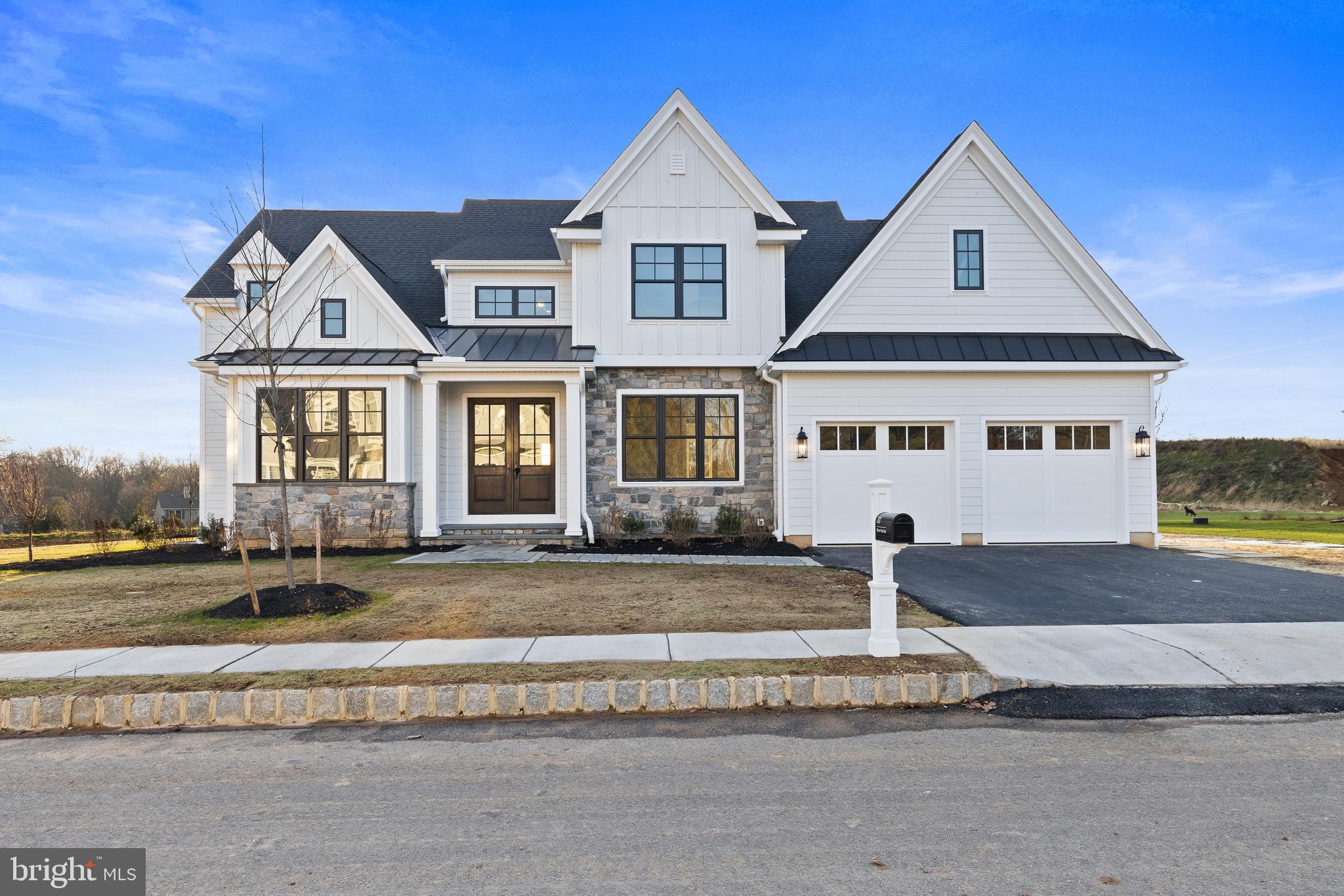 Troutbeck Farm is now 95% SOLD OUT,   Introducing The Greenbriar at Troutbeck Farm an innovative, modern Main Floor Primary Bedroom plan. Troutbeck Farm is sited in bucolic Willistown Twp., within walking distance to downtown Malvern and amidst Philadelphia's historic Main Line. Troutbeck is the latest community brought to life by local, semi-custom and award winning Moser Homes. This spectacular setting of nearly 70 acres is breathtaking offering community walking trail, enchanting pond and enjoy your weekends as the HOA maintains your lawns . One could say this offering can not be duplicated, however, now available to only 34 lucky home buyers. Hallmarks of Troutbeck Farm include; Long curved tree lined entry approach, cobblestone curbs, mature perimeter property plantings and site trees, community walking trail, stylish home exteriors with Quarry Cut stone, James Hardie siding and Brick, manageable home sites backing to open space. Interior features include; Open floor plans with abundance of windows and light, 800 sq. ft of finished lower level living space, 10' main floor ceilings, oversized baseboards, solid interior doors, moldings to include crown and Adams casing at all windows and cased openings, beam ceiling in the family room, bookcase at the fireplace, private main floor study, butler pantry, generous mudrooms, wide plank engineered hardwood flooring on the main level,  3 story open staircase, Local Chester County Kitchen with Bosch SS appliance package with 6 burner commercial cook top and french door refrigerator, lavish 5 piece primary bath with dual sinks and free standing tub and much much more! At Moser Homes customization is welcomed and encouraged, we love watching your dream home come to life. Work with our local craftsman, vendors and trade partners. Troutbeck offers an incredible location, close proximity to PHL International Airport, Regional and Amtrak services, major roadways and dining, shopping and entertainment destinations from, Phila., The Main Line and West Chester areas making this a true Town and Country lifestyle! (Photos of the Greenbriar shown may feature custom options not included in the standard specifications.)
