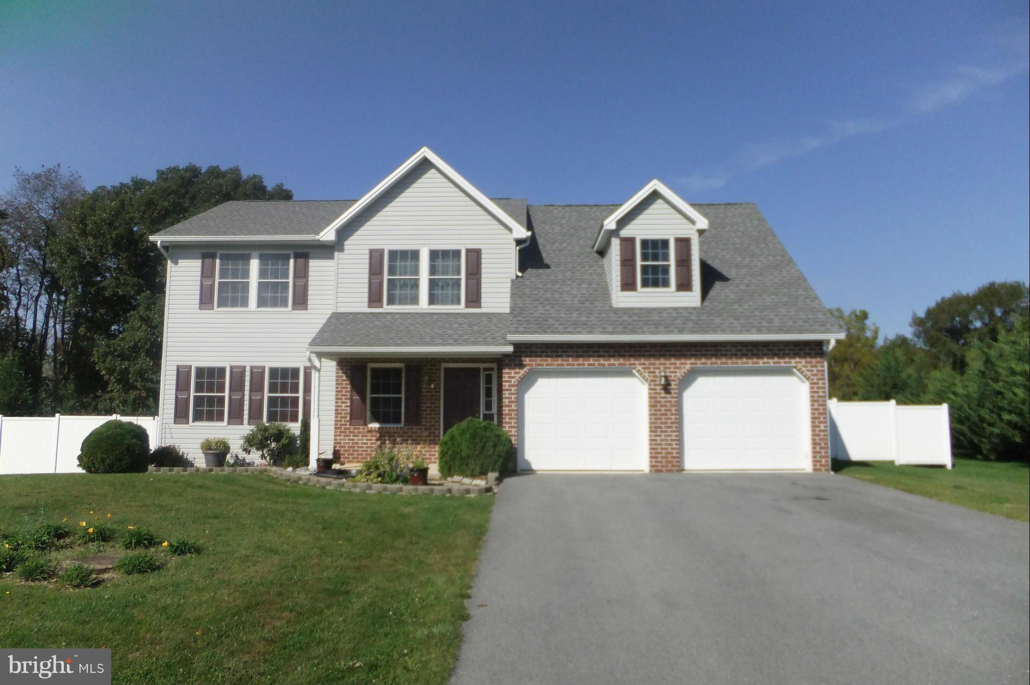 Spacious 4 bedroom, 2.5 bath home located in quiet desirable Shippensburg neighborhood. 2066 sq ft, Fresh paint, New carpeting in separate living room and family room with plenty of privacy, Large eat in kitchen, Convenient 1st floor laundry room, 2 car garage, Rear fenced yard, Large deck off of dining area, Stainless appliances, Covered front porch.  Move in ready!