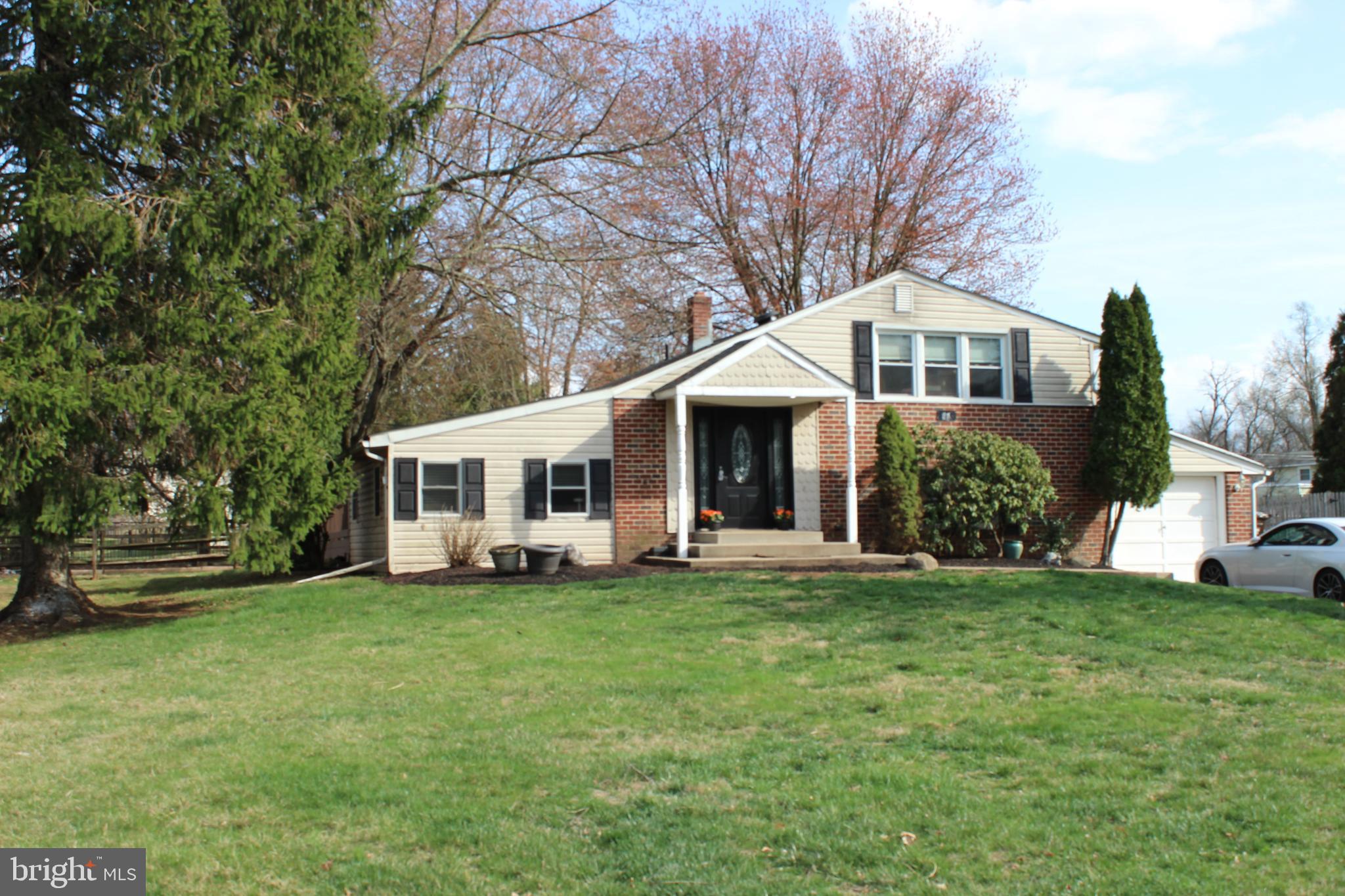 Welcome to this 4-bedroom home tucked away on a quiet street, offering both comfort and convenience. A thoughtfully designed addition adds an extra 200 square feet to the master bedroom, creating a spacious and relaxing retreat. Enjoy cooking and entertaining in the kitchen, complete with modern finishes, and take advantage of the hardwood floors that flow throughout the main living areas. The finished basement provides additional living space—perfect for a home office, gym, playroom or even another bedroom. Step outside to a back deck that's perfect for grilling and hanging out with friends, all while overlooking a generously sized yard that offers endless possibilities for gardening, play, or future expansion. Located in a prime spot with easy access to Routes 309, 202, 73, 63, and the PA Turnpike, this home makes commuting and travel a breeze while keeping you close to shopping, dining, and local amenities. Property being sold as-is. Don’t miss this rare opportunity—schedule your private tour today and make this wonderful home yours!