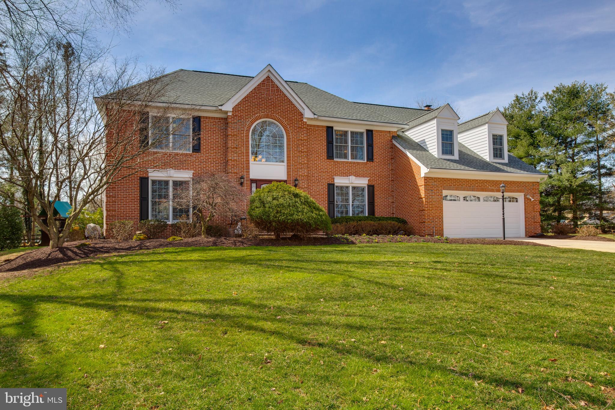 This gorgeous home has been incredibly updated over the years from top to bottom! Unparalleled transformation with this stunning remodel. So much thought, attention to detail, and loving care went into this home as you'll see when you tour it!  Stunning improvements in every corner! You're engaged immediately as you pull up to this stately home and it's gorgeous landscaping. The brick walkway and front stoop guide you into the front door and the open two-story foyer greets you. A private first floor library with new walnut flooring and living room, lead to the ample dining room and kitchen. The Kitchen features a cooking island and a wall of windows overlooking a beautiful backyard. Then the jewel of the main level. The family room and the solarium were transformed into one to create a magnificent and functional great room featuring a new stacked stone gas fireplace and mantle, built-ins, beverage refrigerator, bar with quartz top, walnut wood flooring, cathedral ceilings with exposed beams and walls of windows! The beautiful backyard features new hardscaping, patio, lighting. Upstairs is just a great! Exquisite Master bath and a newly created walk in closet with built in's! Hall bath remodel to include new washer and dryer. Lower level features a game area and rec room area plus a room one could use as a music room or exercise room with glass French doors. And, no, the sellers did not forget about the bones of this home! Windows, doors, siding, HVAC gas furnace, Heat Pump and roof to name a few have all been replaced! This home is the definition of "Must See"! So - come see it!