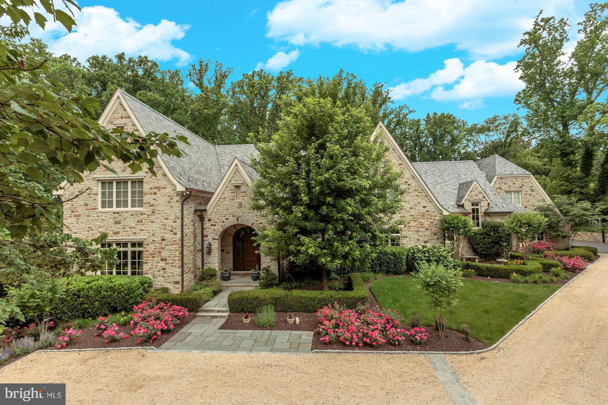 English Manor estate in prestigious Langley Farms located at end of private street 1+-acre lot. Approx.13k sqft of finest craftsmanship, offers unparalleled style, elegance, & luxury. 5BR up, elevator, 7 FPs. Stunning pool, outdoor FP, extensive hardscaping+patios & expansive gardens.10ft ceilings, lux Master, limestone BAs, etc.  Slate roof, Lutron lights, wine cellar, sauna, etc. Truly special!