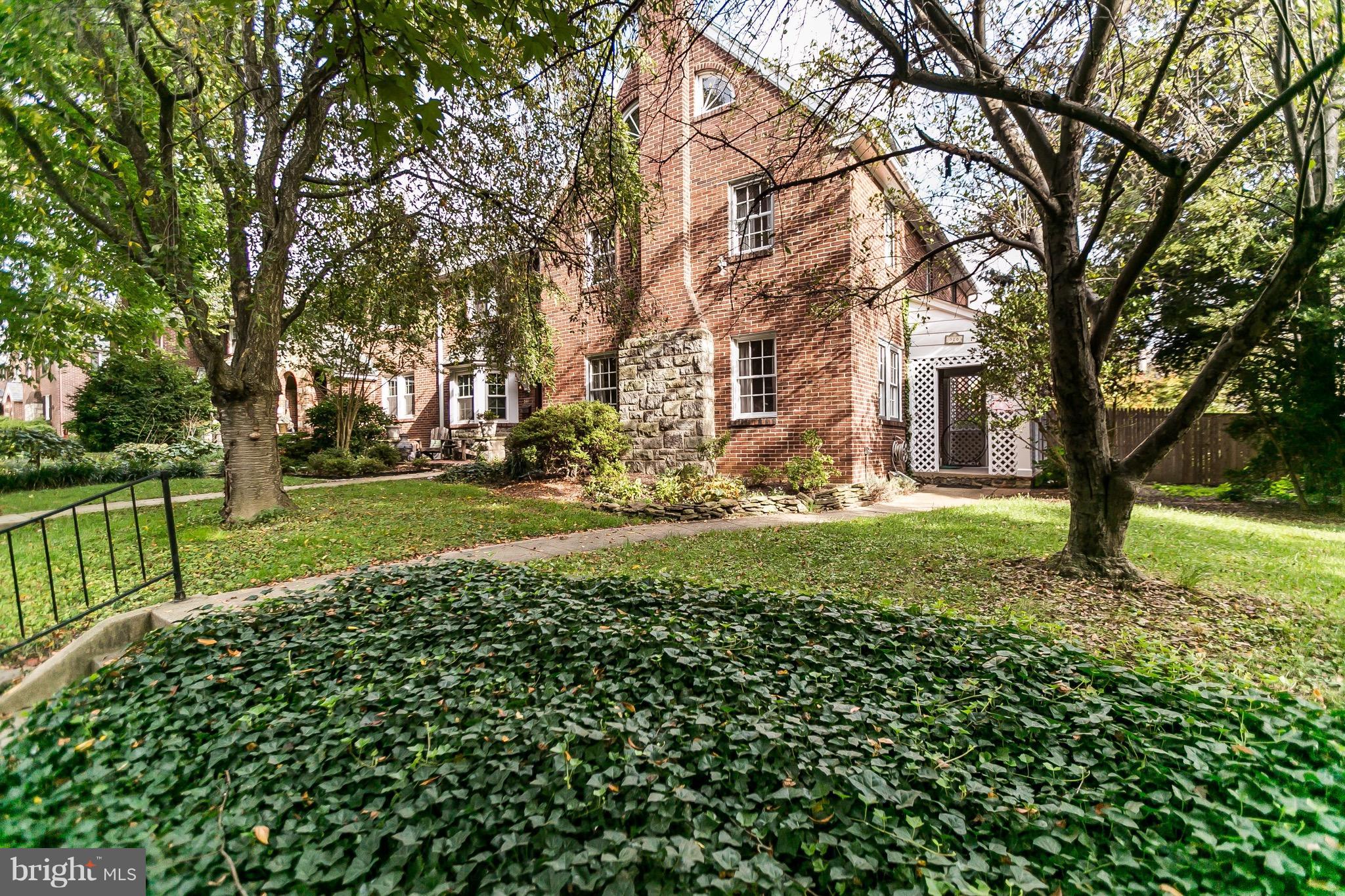 REDUCED! Great opportunity to own a gracious & large 5 BR, EOG center hall colonial on a lovely tree-lined block in Rodgers Forge. Just  blocks from local schools featuring: Lovely side porch, hardwood flrs throughout, Living Room w/FP, large fenced & landscaped rear yd. 3rd lvl BRs w crescent windows & full bath. Detached garage. Side entrance allows for foyer & larger living room. Sold AS-IS.