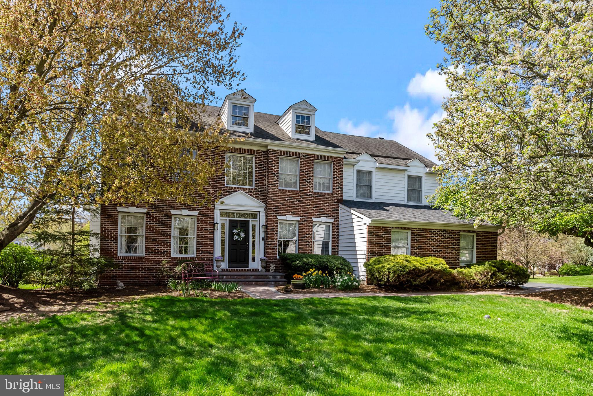 Tucked away in the serene Bucks County neighborhood of Penn's Fields at Farmview is this spacious brick front Colonial with 5 bedrooms, 3 1/2 bath which features a first floor in-law suite! The first floor features a 2 story entry hall, private office, front to back formal living room and dining room; a large kitchen with breakfast area with access to the huge rear composite deck overlooking a vast open backyard; the family room with fireplace also overlooks the kitchen; a powder room and laundry room with access to the attached two car garage, and finally a spacious first floor in-law suite with full bath and a soaring living room ceiling!; the second level features a huge primary suite with tray ceiling, a sitting room,  a full bath with vaulted ceiling and two walk-in closets; three additional spacious bedrooms and a hall bath complete this level;  the basement level features a large finished entertainment space plus two large storage/utility rooms on either end; located in the award winning Pennsbury School District;  while the location is tucked away it is still convenient to everything - 5 minutes to I-295, also convenient to Route 1 and the PA Turnpike as well as regional rail service in Yardley, Trenton or Hamilton NJ; only a short drive to Core Creek County Park as well as Tyler State Park and only a stone's throw to 9-11 Memorial Park with tennis/pickleball courts, basketball courts and walking trails; this home truly checks all of the boxes...