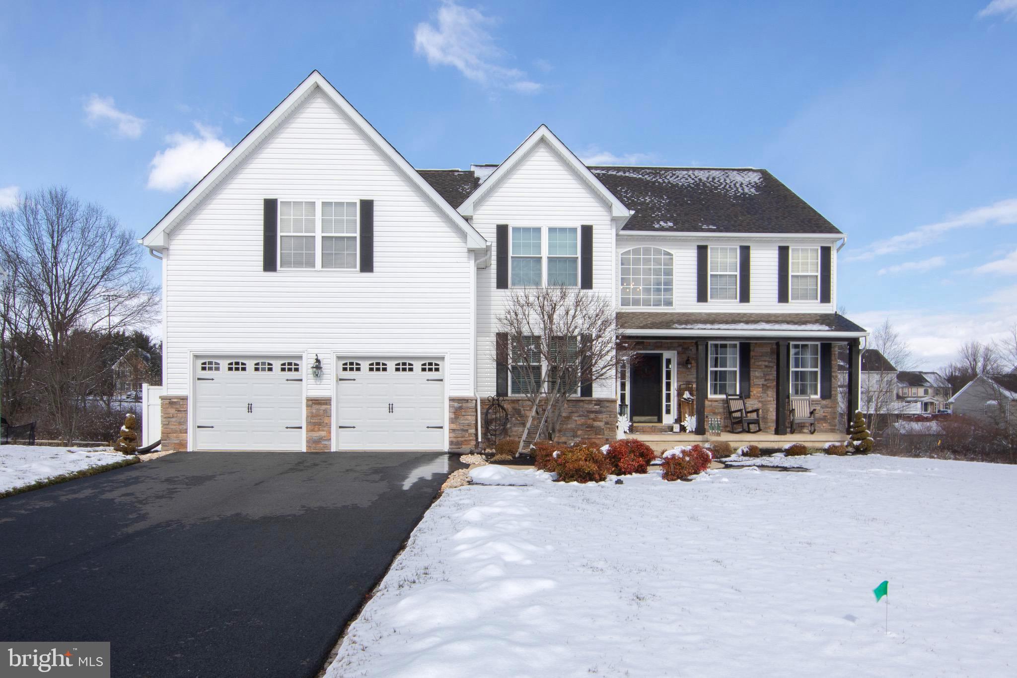This beautifully updated & impeccably maintained home sits on a professionally landscaped lot in the highly sought after Wiltshire at Oxford community in East Nottingham Township. Enter from the quaint front porch into the grand 2-story foyer, which is situated between the office & the living room and adjacent formal dining room, all w/crown moldings and over sized windows, which provide plenty of natural light. The gleaming hardwood floors lead to the gourmet kitchen w/granite countertops, center island w/additional seating, stainless steel appliances, tile backsplash, recessed lighting, and casual dining area. The slider door leads to the composite deck w/steps down to the spacious backyard w/mature trees, which provide nice privacy. Back inside, the kitchen is open to the impressive 2-story family room w/floor to ceiling stone fireplace, skylights, ceiling fan, and back staircase. The powder room w/chandelier, updated mudroom w/tile floor & utility sink, and 2-car garage w/epoxy floor & storage cabinets, complete the 1st floor. The 2nd floor features a spacious primary bedroom w/cozy sitting area, ceiling fan, and walk-in closet. The primary bathroom offers a jetted tub w/tile surround, shower, water closet, vanity w/dual sinks, and linen closet. Just off the primary bath is the conveniently located & sizable laundry room. 3 additional generously sized bedrooms w/more than ample closet space, and the hall bathroom w/tile floor, dual sink vanity, and tub/shower combination complete the 2nd floor. The expansive walkout finished basement boasts a custom live edge wet bar w/tile floor & wood encased beams, a cozy den w/stone feature wall & natural gas heating stove, additional finished living space, recessed lighting, powder room, large storage/utility room, and slider door leads to the private patio & backyard. Additional upgrades include: new HVAC system (2020), composite deck resurfaced (2022), stone veneer on front exterior (2020), kitchen updated (2020), mudroom updated (2022), finished basement & added powder room, driveway replaced, refinished hardwood floors & replaced remaining flooring throughout, lighting fixtures & recessed lighting, numerous exterior/interior & garage doors replaced, lower level patio, updated bathrooms, multiple rooms recently painted, and more. Conveniently located close to major routes, restaurants, shopping, and more. Don't wait, schedule a showing today!