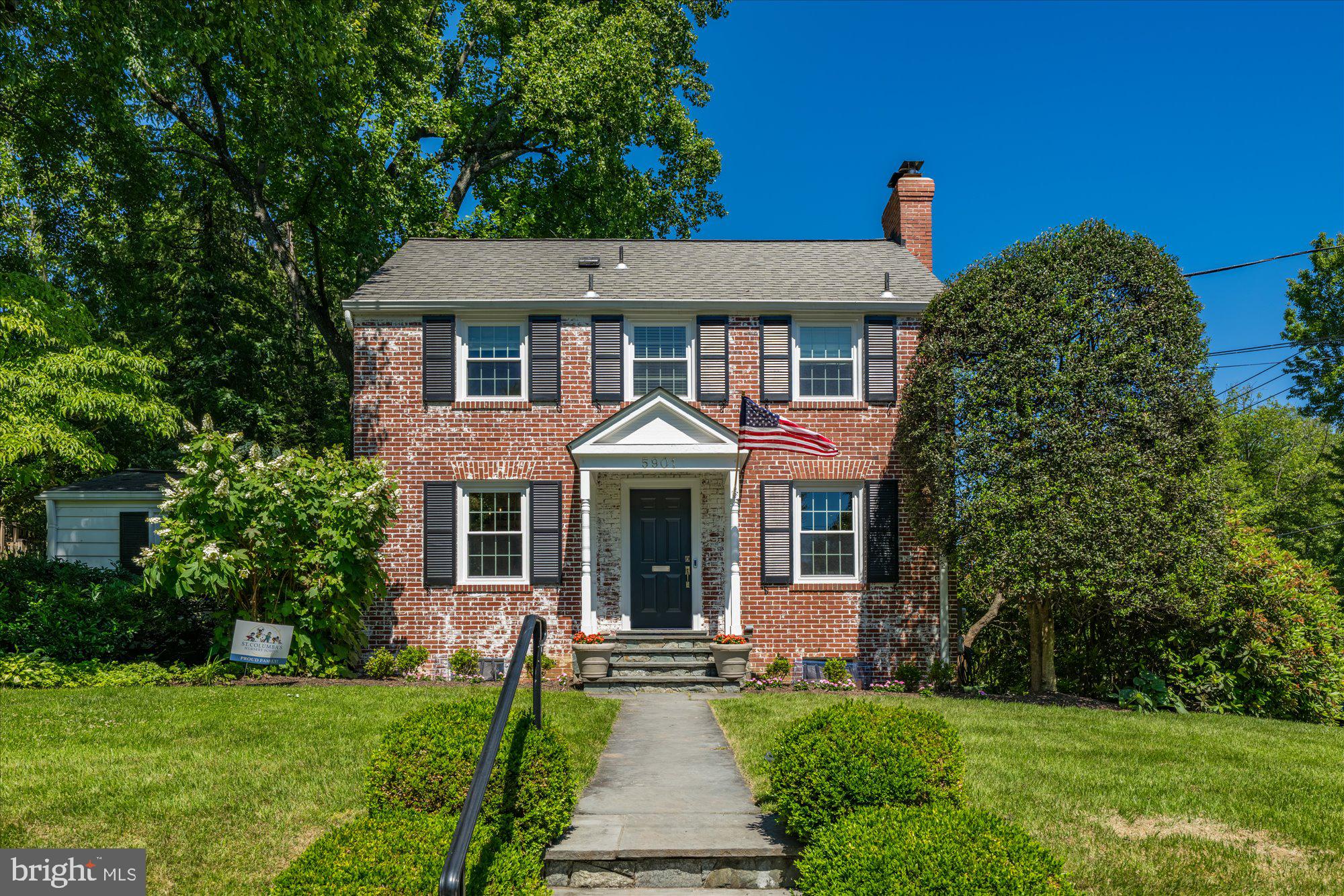 JUST LISTED in Woodacres! Open houses Saturday (6/6) and Sunday (6/7) from noon to 3 p.m. This charming Bethesda home is ready for you—don’t miss the chance to own this beautiful property on a sought-after corner lot. Schedule a private tour today! Built in 1955, this brick colonial sits on a sunny, southeast-facing corner with mature landscaping—including a breathtaking rhododendron that just finished blooming and beautiful peonies—that enhances its curb appeal. A welcoming front portico leads into the Main Level foyer, which features hardwood floors extending into the Living Room with a wood-burning fireplace, the Family Room with a cathedral ceiling, the Stainless Steel Kitchen, the Formal Dining Room, the Powder Room, and a Den/Home Office. A sliding glass door from the Family Room opens to a large rear deck and garden. The Second Level offers three bedrooms and two full bathrooms, including a Primary Bedroom with an en suite bathroom. The Lower Level includes a Recreation Room, a second Powder Room, a Laundry and Storage Room, and direct access to the 1-car garage. RECENT UPDATES INCLUDE NEW WINDOWS, A FRONT DOOR, AND A SLIDING DOOR IN 2025; BUILT-IN DRAWERS AND CLOSETS IN THE PRIMARY BEDROOM IN 2024; A HIGH-END HVAC SYSTEM WITH A HUMIDIFIER IN 2026; CHIMNEY RELINING IN 2024; A WATER HEATER IN 2022; EXTENSIVE TREE WORK IN 2025; WALL-TO-WALL BASEMENT CARPETING IN 2026; AND FRESH PAINT THROUGHOUT THE HOME. Located in one of Bethesda's most desirable neighborhoods, it features excellent schools, beautiful parks, and lively community traditions like the Fourth of July and Halloween parades, as well as community gatherings and block parties. Don't miss this fantastic opportunity to live in one of Bethesda’s most sought-after areas!