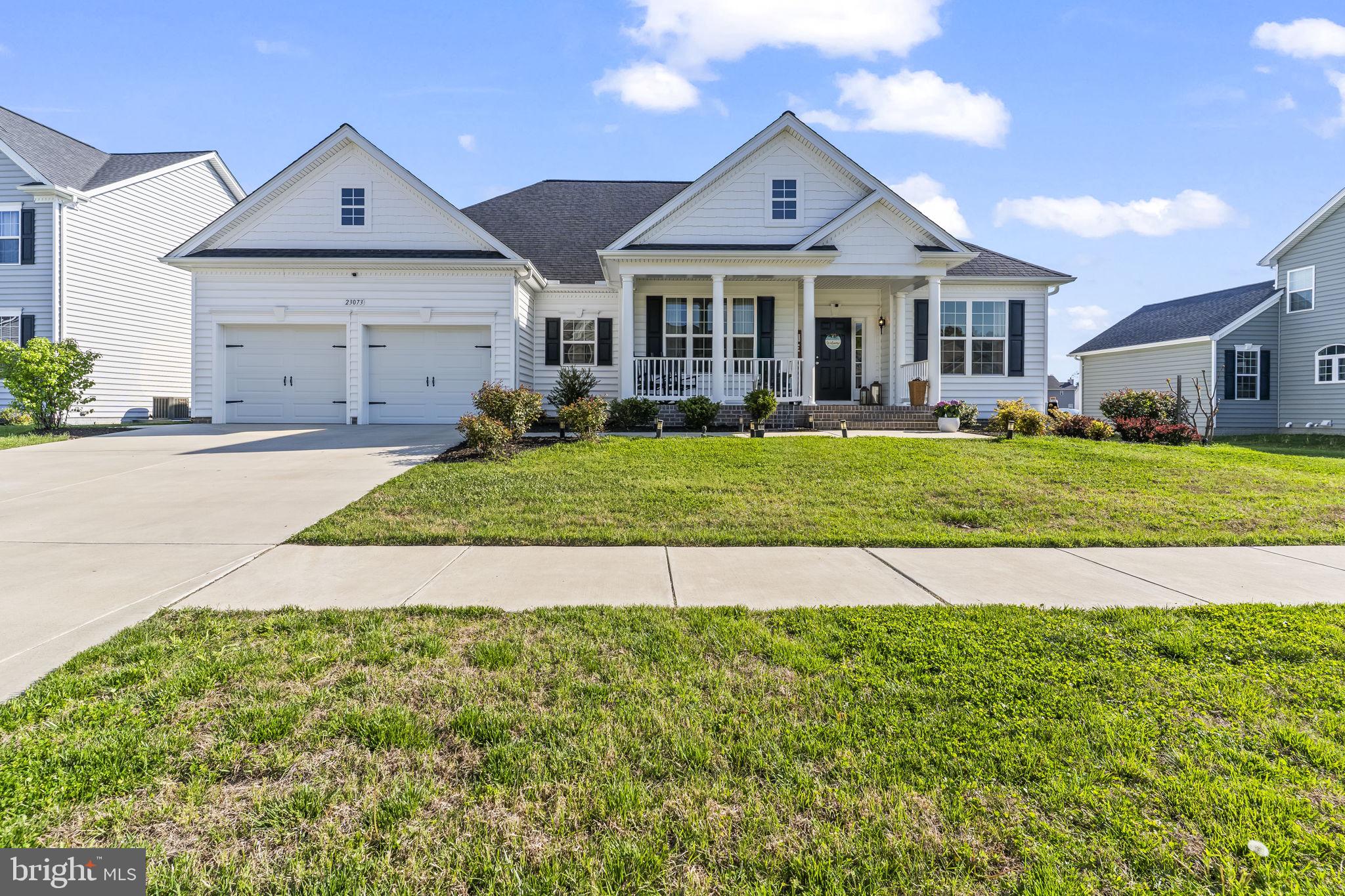 Welcome home to 23073 Town Run Drive!

Built in 2022, this beautifully maintained home in the highly sought-after neighborhood of The Meadows at Town Run in Leonardtown is truly a standout. Built by QBH, this desirable Ashland model offers thoughtfully designed living space with an open and inviting floor plan—perfect for both everyday living and entertaining. This home truly shines, showing like a designer model home with stunning custom finishes and upgrades throughout.

This spacious residence features 3 generously sized bedrooms, 2 full bathrooms, and a 2-car front-load garage. From the moment you enter, you’ll appreciate the attention to detail, including elegant crown molding, chair rail accents, custom trim in the primary bedroom, and 9-foot ceilings that enhance the sense of space and sophistication.

The heart of the home is the beautifully upgraded kitchen, featuring a custom backsplash, specialty hood over the cooktop, farmhouse sink, sleek modern refrigerator, upgraded countertops, and stainless steel appliances, along with a bright breakfast area ideal for casual dining. The kitchen flows seamlessly into the cozy family room, where a shiplap accent wall over the fireplace creates a warm and stylish focal point.

Throughout the home, you’ll find custom built-in cabinetry in the pantry and primary closet, adding both functionality and elevated design. The laundry room is thoughtfully finished with custom shelving and trim, making everyday tasks feel anything but ordinary.

The primary suite offers a private retreat with a spacious walk-in closet and a beautifully upgraded en-suite bath, featuring a built-in electric fireplace with a stunning shiplap surround—a truly unique and luxurious touch.

Step outside to enjoy the well-designed outdoor living space, including a screened-in porch perfect for morning coffee or evening relaxation, and a paver patio ideal for entertaining. The fully fenced backyard offers privacy and space for outdoor activities, pets, or gardening.

The additional bedrooms are nicely sized and offer flexibility for guests, a home office, or hobbies.

Located just minutes from shopping, dining, and all that Leonardtown has to offer, this home perfectly blends style, comfort, and location.

Don’t miss your opportunity to own this one-of-a-kind, designer-inspired home!