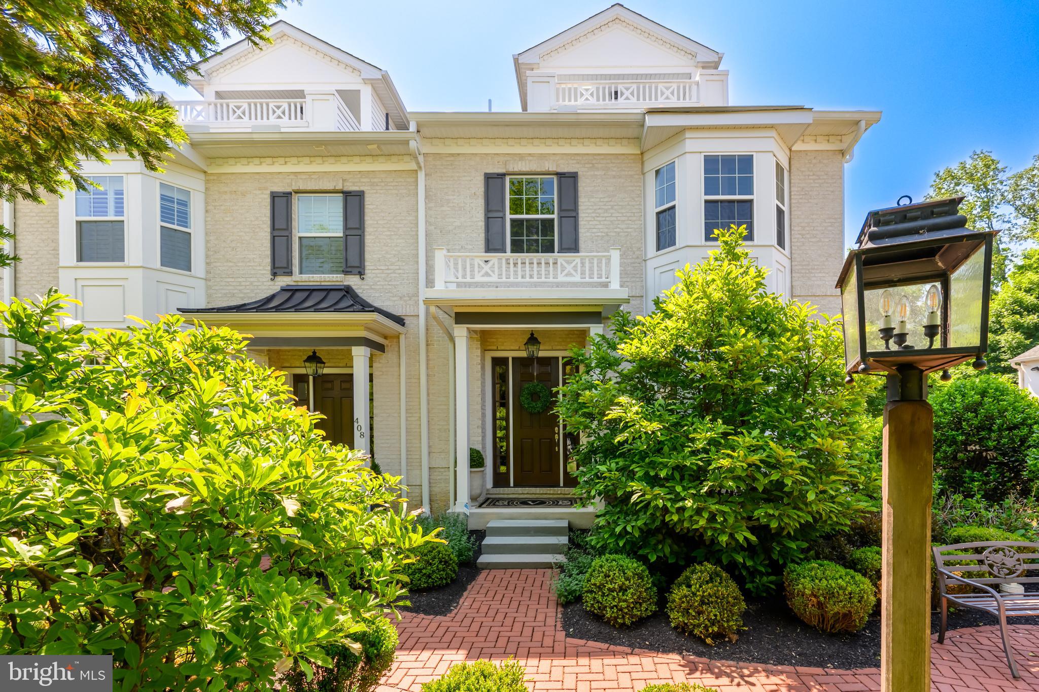 Luxury living at its finest, right in the heart of West Chester Boro. Situated at the corner of Church and Dean streets, 410 S Church St is an impressive end-unit townhome that enjoys a premium location within the community, overlooking a brick courtyard. This home offers walkability, parking, high-end finishes, and rooftop terrace views. The open concept floorplan is exceptionally designed, and features high ceilings, custom shutters, a gas fireplace, stunning hickory wood floors, and a designer chef’s kitchen with a Wolf gas range, SubZero refrigerator, natural stone countertops, and custom cabinetry. Windows on 3 sides provide beautiful natural light, enhancing the allure of each living space. The bedroom level offers 3 bedrooms, 2 full bathrooms, and the conveniently located laundry – all maintaining the theme of chic design with spa-inspired fixtures and custom closet designs throughout. The primary bedroom suite sets itself apart with an immense custom walk-in closet and a lavish en suite bathroom that includes heated towel rails, porcelain tile and quartz countertops. Not to be outdone, the 3rd floor penthouse level offers a sophisticated space to set up a home theater, rec room, or dedicated home office, and it also boasts a custom built-in cabinet with an integrated Monogram beverage center. This level also features a convenient powder room as well as step-out access onto the rooftop terrace where you can enjoy some beautiful evening sunsets. 410 S Church St also offers a finished lower level that provides excellent storage as well as another opportunity to set up a home office, workout space, or more. And, there is a 2-car garage that also boasts an extra storage room, and there are also 2 additional covered parking spots. This is the lifestyle you’ve been craving – situated in an enclave of luxury townhomes with low maintenance living, and you can walk to the bountiful array of Borough shops, restaurants, festivals, parks, and attractions. Request a personal tour today!