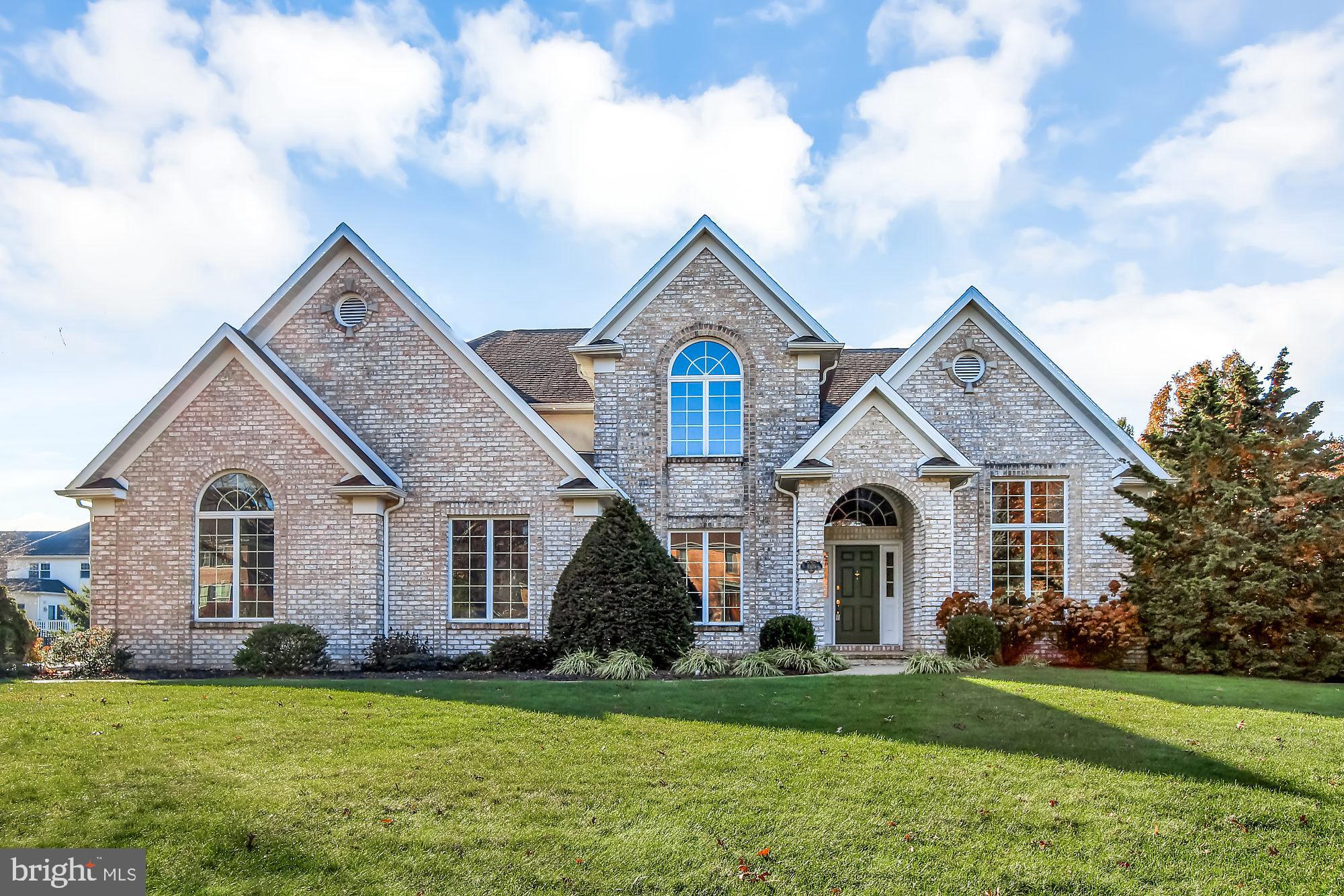 Opportunity is knocking! OWN a beautiful Jeffrey L Henry built 4BR, 3 Full/2 Half bath Residence. Located in one of York's most prestigious communities, Brittany. It combines beautiful architectural features and craftsmanship into a home that whispers, "success." With its all brick exterior, wonderful design and long list of luxury amenities, it would be impossible to duplicate at the list price.  It showcases almost 5000 square feet of gracious living space. You will love the varied ceiling heights; living room with gas fireplace and wet bar; double staircase to the 2nd floor; luxury master suite, with secret 12x18 closet featuring custom organization; Jack 'n Jill bedroom/bath; and the spacious walk-out lower level, with additional living space and private steps, to the garage and the backyard. Relax on the back patio and enjoy the impeccably maintained grounds that provide an ambiance of quality living. Finished end-load garage with additional storage area. It really is a home your family will love! Located minutes to the new UPMC slated to open in August, tons of west-end conveniences, Cousler Park, Outdoor Country Club, Rt30 and I83. Ready for immediate occupancy! Newer roof. Rinnai Tankless Water Heater, York Furnace with Humidifier, updated master bath (2014), new air conditioning system (May 2019).  AGENTS - Please read Agent Remarks!