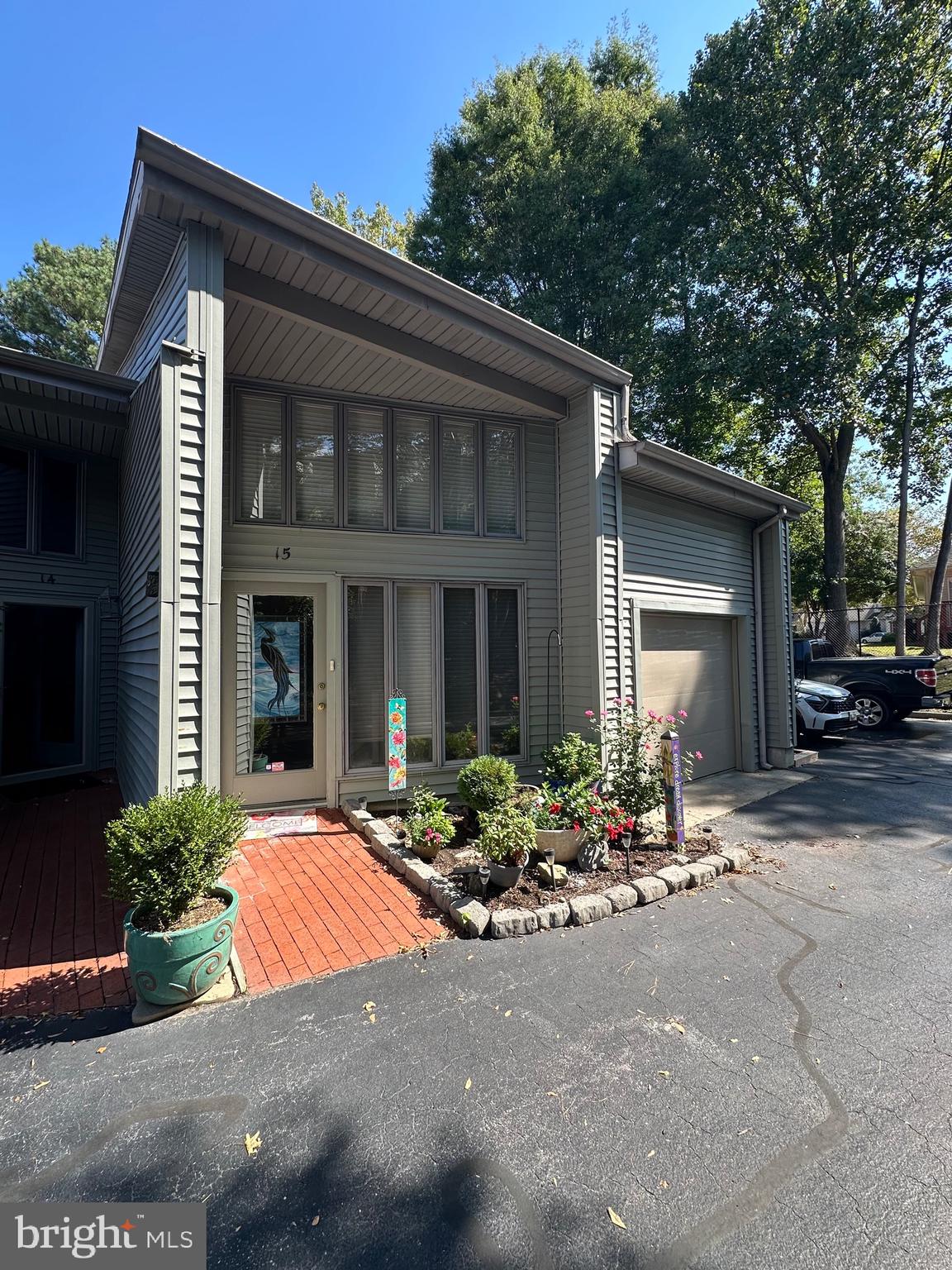 Large end unit in desirable Canal Woods IV.  Open floor plan features 4 bedrooms and 3 full baths. Beautiful water view of Tony Tank pond.  This end unit has more windows and a side/kitchen entrance with first and second floor decks and a fireplace in the living room. Close to SU and right around the corner from Tidal Health facilities. Very private setting. HOA fees include:   Property Insurance, Flood insurance, Water and Sewer, trash, ground maintenance, Roof and siding repair and replacement and reserve funds.  Only 6 waterfront units.