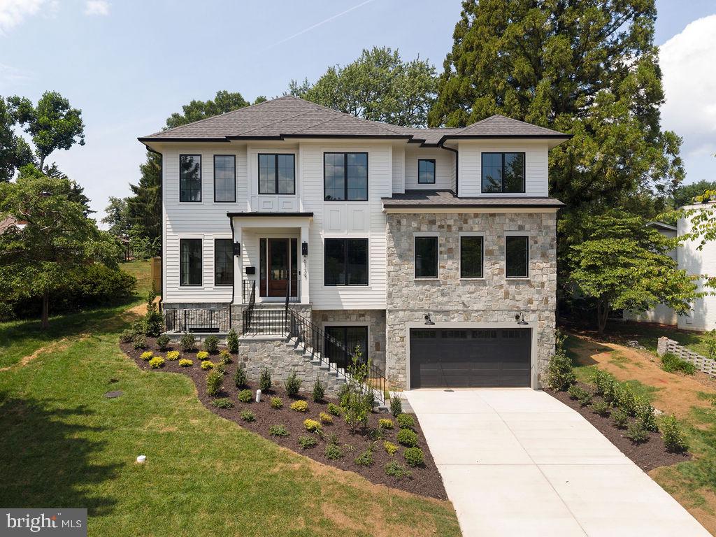 Cherry Hill Custom Homes presents this beautiful new custom home in Potomac Hills. This home features 6 bedrooms, 6 full bathrooms, and one powder room with 6,746 square feet of finished living space over three levels. The main level includes 10ft ceilings, gorgeous wide-plank engineered white oak wood floors, a beautiful gourmet kitchen with frame-less custom cabinetry and quartz countertops and a rear prep kitchen/pantry. The kitchen connects to a great room with coffered ceiling and gas fireplace with tile surround and a spacious casual dining area overlooking the backyard. Through the butler's pantry is an elegant formal dining room with abundant natural light. A screened porch and bluestone patio off of the great room provide two amazing outdoor living spaces overlooking the backyard. A generous guest suite, private study, and formal powder room complete the main level living spaces. The upper level is highlighted by a luxurious primary suite with spacious dual walk-in closets with built-ins, a spa-like bathroom with heated floors, double vanities, stand-alone soaking tub, and heavy glass enclosed shower. The lower level includes a recreation room with wet bar, a large exercise room with rubber flooring, an additional en-suite bedroom, a 2nd home office, a mudroom with built in cubbies and a spacious 2-car attached garage. This home includes an elevator that services all three floors. The professionally landscaped 13,397 square foot lot features an 85 foot deep backyard with an irrigation system and plenty of room for a pool. Convenient to Chesterbrook Swim and Tennis Club, Chesterbrook Shopping Center, and Chesterbrook ES/ Longfellow MS/ McLean HS.
