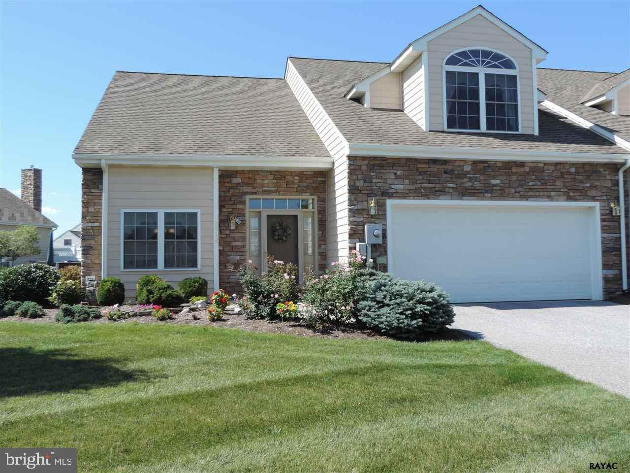 Meticulous end unit condo in Spring Meadows w/many upgrades! Spacious & open flr plan featuring 1st flr MBR w/WIC & full bath, 2 story great room w/gas fp w/stone surround & sliding doors to patio. 2 lg additional BR's w/WIC's on 2nd flr. Kit w/dining area, upgraded cabinets, cer tile flring & all appli's inc. 1st flr lndry & lots of storage throughout!