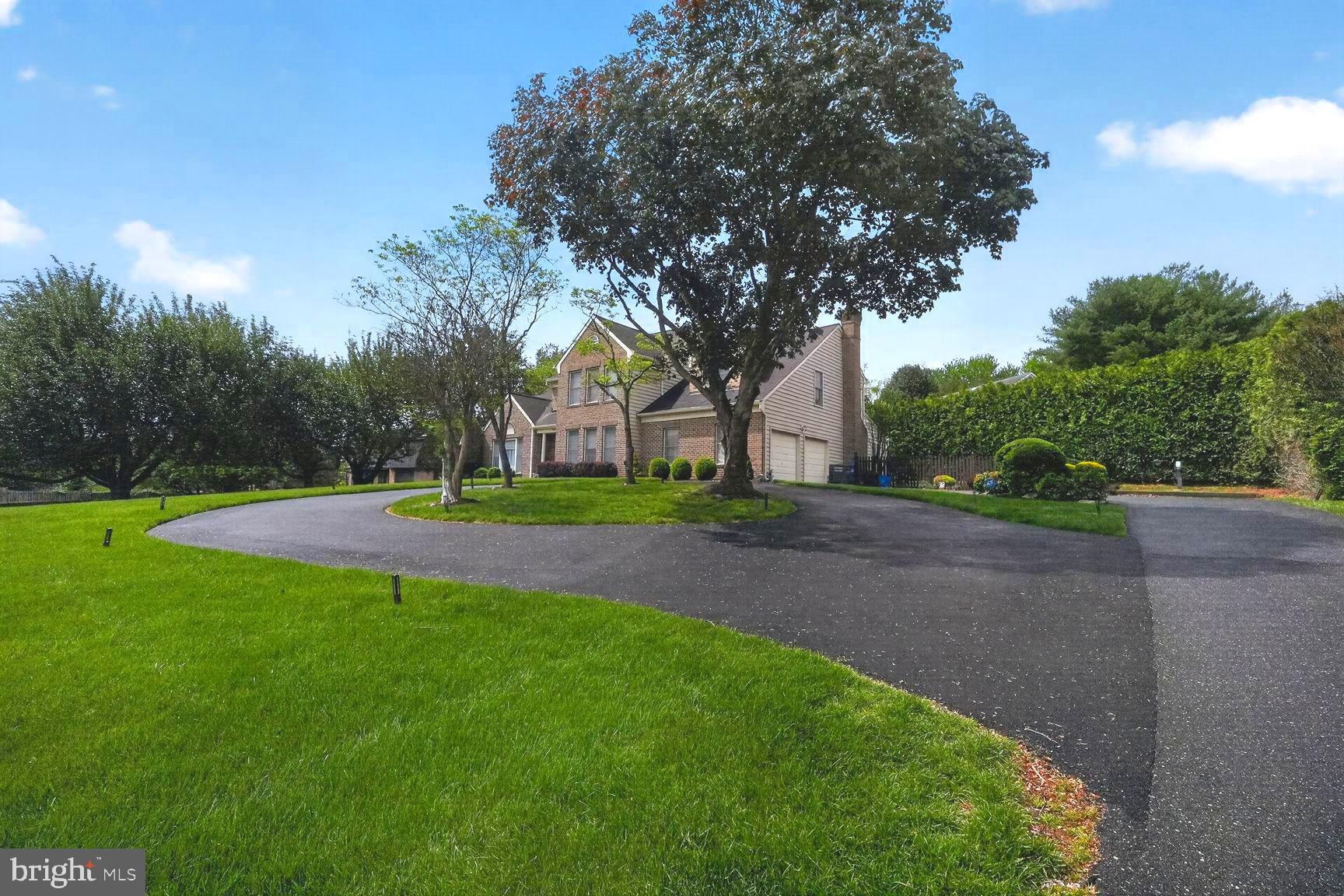 Welcome to this exceptional residence in idyllic Darnestown Hills, where refined design meets effortless, resort-like living. Offering over 5,000 finished square feet across three beautifully finished levels, the current owners have invested nearly $300,000 in upgrades over the last three years, and the quality of those improvements is evident throughout. The heart of the home is the chef’s kitchen, a true showpiece with sleek, two-tone European-style cabinetry and a full suite of commercial-grade Miele appliances. A built-in Miele espresso machine and a wine fridge discreetly integrated beneath a perfectly proportioned waterfall countertop, creating both a functional workspace and a striking visual centerpiece. The kitchen opens seamlessly to a large family room, where a stylish fireplace adds warmth and character while complementing the generous scale of the space. This open layout is ideal for both everyday living and hosting gatherings. Stepping outside, you’ll discover a resort-caliber retreat in the backyard. A heated pool and spa provide the focal point, enhanced by resurfaced finishes, professionally redesigned lighting, and lush landscaping that create a stunning atmosphere both day and night. The new, fully equipped gazebo with bar seating makes outdoor entertaining effortless and inviting.The main level also includes a formal living room, a formal dining room, and the perfect home office behind glass French doors. Upstairs, the luxurious owner’s suite awaits, featuring a new spa-like bathroom with a fireplace overlooking the soaking tub, a spacious walk-in shower, and magazine-worthy finishes. A peaceful sitting area and two walk-in closets provide comfort and convenience. Three additional well-proportioned bedrooms and another beautifully renovated bathroom complete the upper level. The beautiful living space extends to the fully finished lower level, boasting two bonus rooms connected by a renovated full Jack-and-Jill bath. This level is ideal for recreation and relaxation, with a stunning built-in wine wall, a workout area, and the perfect place for movie watching. Practicality pairs with luxury through the home’s abundant parking options, including an extended driveway and a new circular driveway at the front of the property, adding both convenience and impressive curb appeal. This property seamlessly blends high-end design, modern functionality, and resort-style outdoor living, offering an exceptional opportunity for its next owner to move in and enjoy immediately.