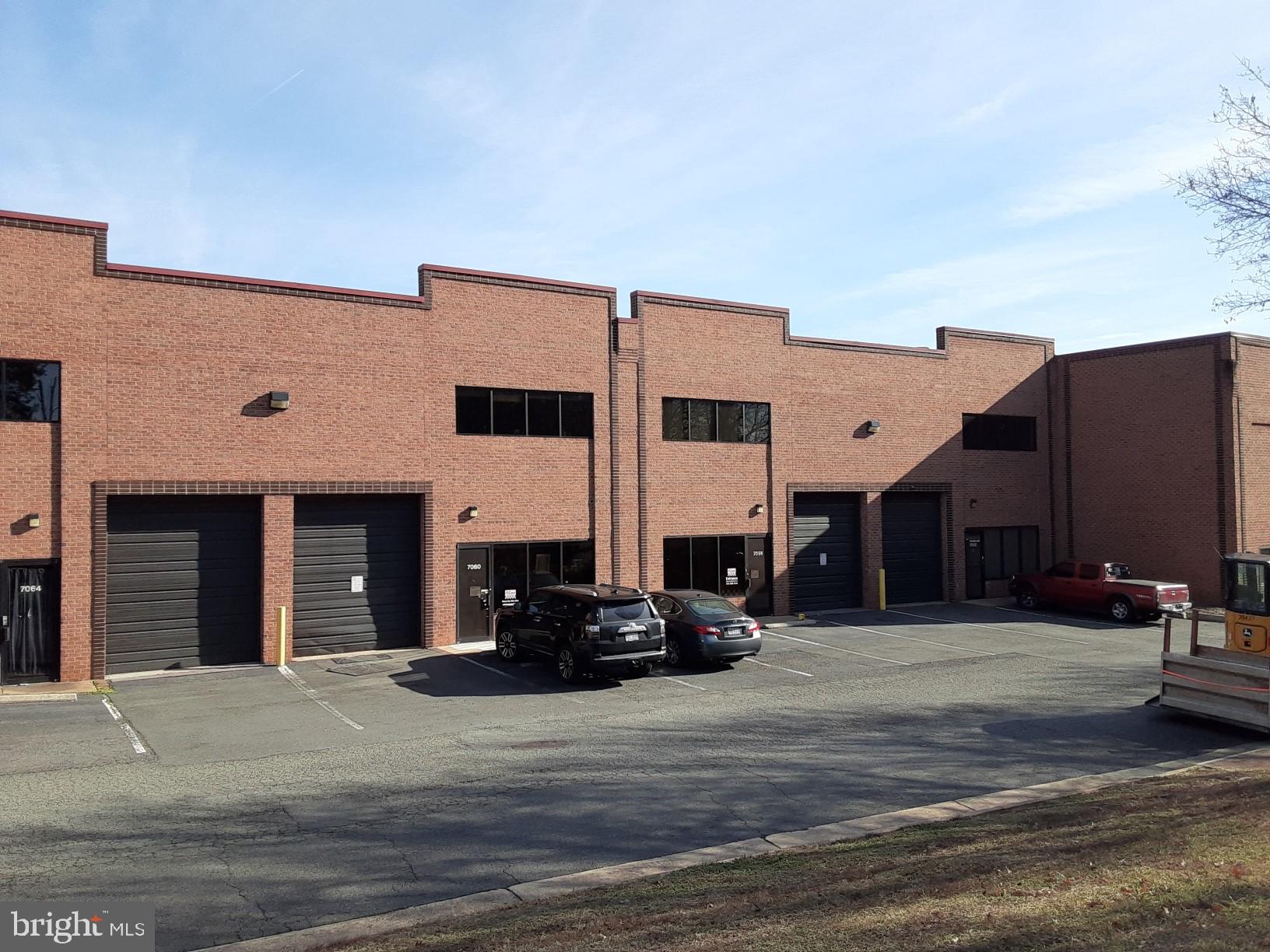 4 flex space units that are connected end to end and side to side with about 8,000 total square feet of space. The current configuration is warehouse, offices, and showroom. Each of the units has a grade level roll up door and a regular door. Located on Tech Circle near the intersection of Sudley road and I-66.  Unit numbers are 7024, 7028,7056, and 7060. It can be divided in to 2 units fairly easily with one being office and showroom and the other one warehouse. The owner may be willing to lease back the office showroom portion long term.