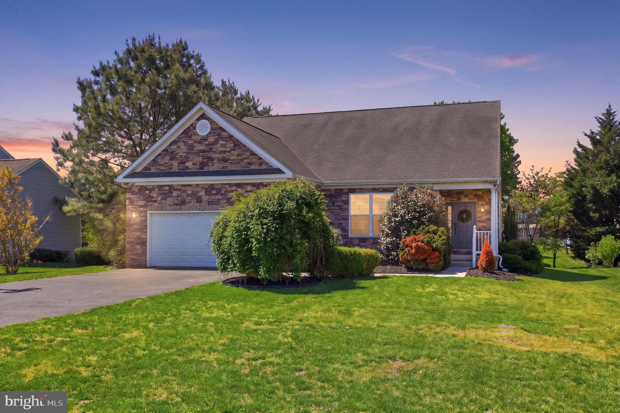 SELLER IS OFFERING A 1-YEAR HOME WARRANTY for added peace of mind! Welcome to Meadows at Shawnee! Ideally located just minutes from Route 1, this well-maintained 3-bedroom, 3-bath home offers convenient access to Delaware beaches, shopping, dining, and everyday amenities. Inside, you'll find a bright, open floor plan with multiple living spaces, including a living room, formal dining area, and a cozy family room with a fireplace. The spacious kitchen features ample cabinetry, generous counter space, and a sunny breakfast area. The main-level owner's suite offers a private bath with a soaking tub and separate shower, while a second spacious bedroom and full bath on the first floor provide added flexibility. Upstairs, you'll find a versatile loft, an additional spacious bedroom, and an updated full bath, making this home ideal for guests, a home office, or multi-generational living. Enjoy the comfort of generously sized bedrooms, a functional layout, and a desirable location in one of the area's sought-after communities. Don't miss this opportunity to make this beautiful home yours—schedule your private showing today!
