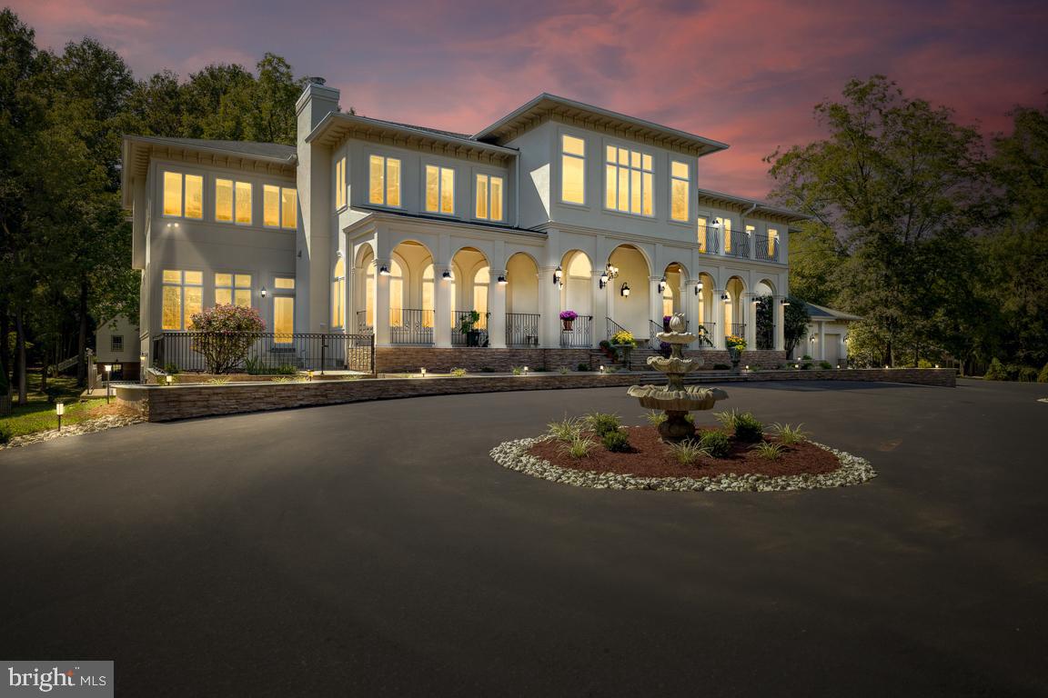 Welcome to 8810 Brickyard Road in the prestigious Potomac community, where sophistication and elegance meet the modern comforts of luxurious living. This extraordinary estate, a masterpiece of design and craftsmanship, has just undergone a meticulous renovation, tailored to meet the needs of a discerning new homeowner. 

Boasting 8 bedrooms, 9 full baths, and 3 half baths across an expansive 12,000+ square feet, this home offers a spacious and versatile layout that is truly one-of-a-kind. Step inside and be greeted by a grand entrance that sets the tone for the magnificence that lies ahead. The foyer features dual staircases that ascend gracefully to a stunning overhang overlooking the vast family room, creating an atmosphere of openness and grandeur.

Indulge in the allure of indoor Juliet balconies that grace two of the bedrooms, offering captivating views of the foyer below. The home's thoughtful design harmoniously blends intimacy and grand spaces. The property spans over 3/4 acres of lush, flat, and private backyard, a serene oasis that invites outdoor relaxation and recreation.

This residence has been tailored to perfection, with 5 brand new bedrooms upstairs, each accompanied by its own brand new bathroom. The master suite is a haven of luxury, featuring an amazing brand new master bath that exudes spa-like elegance. The brand new master closet ROOM is a work of art in itself, adorned with built-in cabinetry to accommodate every facet of your wardrobe.

Step outside onto the brand new expansive back deck, an ideal vantage point to admire the picturesque surroundings. The spectacular brand new kitchen is a culinary enthusiast's dream, equipped with top-of-the-line appliances and finishes that cater to both aesthetics and functionality.

This large estate is perfect for multi-generational living! Currently set up with two separate & private living spaces in the lower level with their own kitchen, the possibilities are many!!

Convenience meets luxury as this residence enjoys a close-in location, offering easy access to Potomac Village, Great Falls, and major highways. Nestled within the sought-after Churchill school district, this home ensures an excellent education for your family.

In a realm of its own, 8810 Brickyard Road stands as a testament to timeless elegance and modern opulence. This is not just a house; it's an embodiment of a refined lifestyle. If you're seeking a residence that transcends the ordinary and captures the essence of extraordinary, your search ends here. Don't miss the opportunity to make this special home yours. Contact us today for a private tour and experience the epitome of Potomac living.