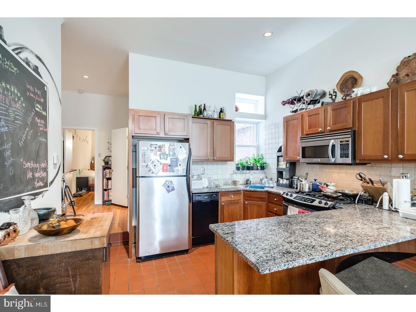 This cozy Queen Village apartment features a spacious living room with an open kitchen, making it the perfect place to entertain guests! With hardwood floors throughout, and a renovated kitchen featuring the latest fixtures and finishes this property won't last long! The large bedroom features a spacious closet to hold all of your necessities, and more. Enjoy a sunny day outside on the private patio, creating the perfect escape from the busy city! This property also features high ceilings and central air, and comes complete with a washer/dryer & dishwasher. The spacious basement of this property ensures that you can store all of your personal belongings! Just minutes from Center City, Rittenhouse Square, and Jefferson - this place is the perfect location!