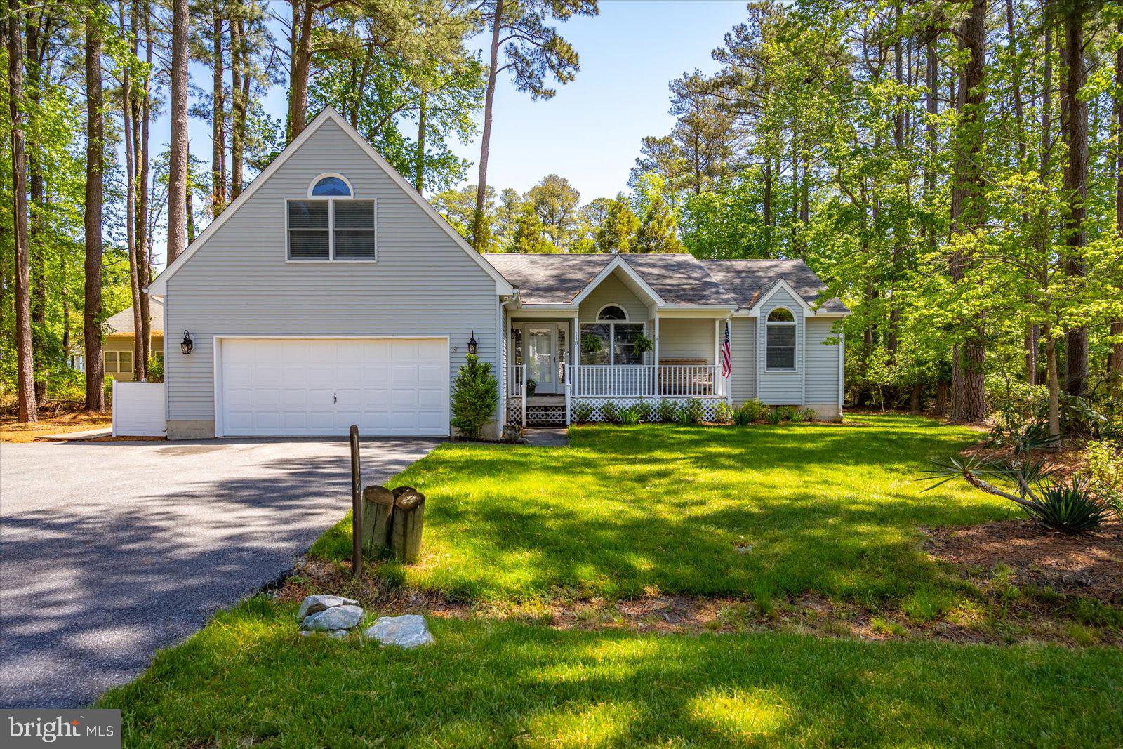 Welcome to Sherwood Forest- Ocean Pines, MD! Nestled Within the highly desirable community of Ocean Pines,just minutes from Ocean City's beaches,boardwalk, and bay, this beautifully maintaned home offers the perfect blend of quality craftsmanship and coastal comfort. Built in 1994, this 3 - bedroom, 2 bath, home features over 2,100 S/F of thoughtfully designed living space including a walk up finished bonus room over the garage that could easily be converted to a 4th bedroom if needed. Open floor plan includes spaciuos kitchen with new appliances. other updates include, luxury vinyl throughout main level,  tankless water heater, carpet, paint, amazing sunroom. Enjoy tranquille views from your screened in porch and outdoor deck to grill, eat, and entertain. Oversized 2 car garage - side entry door to boardwalk.