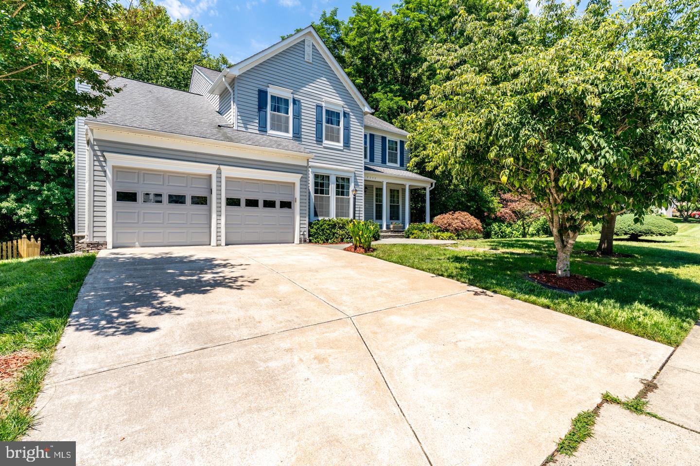Move in ready beautifully well maintained home in Blooms Crossing. Freshly new paint throughout. New gutter installed in 2025, New hot water tank in 2024. Hardwood floors on main and upper level. New gas range/stove and new dish washer, new micro wave, new washer and dryer, granite counter top, 2 fireplaces, deck with gazebo, Trex decking boards with stairs to back yard. Fully paid lawn care contract until Spring 2007. Flagstone patio with swim spa, new painted in 2025 fenced rear yard. Most finished walkout basement with den is extra living spaces. Just minutes from the VRE station and conveniently located near major commuter routs.