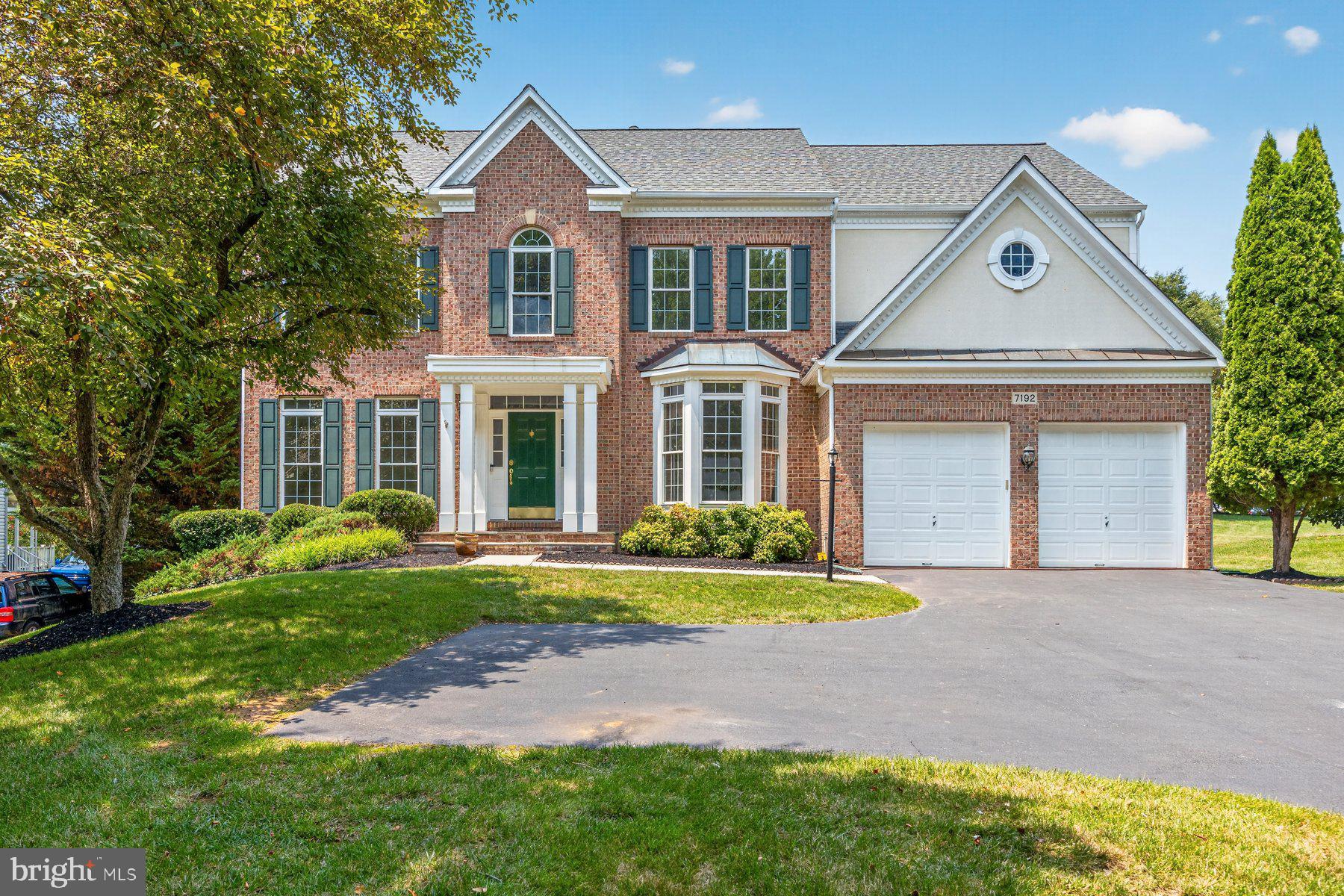 Welcome to this beautiful 4-bedroom, 4.5-bath home in the sought-after Grovemont community of Elkridge. Freshly painted throughout with newly refinished hardwood floors on the main level and a brand-new roof, this home is truly move-in ready. 
The main level offers a spacious layout designed for both everyday living and entertaining. The large kitchen features quartz countertops, stainless steel appliances, abundant cabinetry, and a Butler's pantry, opening to a comfortable family room with a gas fireplace. Elegant double staircases add architectural charm, while the thoughtful floor plan provides plenty of space to gather and unwind.
Upstairs, you'll find four generously sized bedrooms and three full bathrooms, including a spacious primary suite with a private office or sitting room plus a large walk in closet. Two secondary bedrooms are connected by a convenient Jack-and-Jill bath, offering both functionality and privacy.
The finished walk-up lower level expands your living space with a large recreation room, full bath, dedicated workout room, and two separate storage areas, including a built-in workbench. Double doors provide easy access to the backyard.
Outdoor living is just as impressive with a large screened porch with full plastic paneled enclosure included, deck, fully fenced backyard, and underground sprinkler system. An added bonus is the spacious, lighted storage area located beneath the entire deck. With approximately 4.5 feet of clearance and convenient access from the right side of the home, this versatile space is ideal for storing lawn equipment, gardening tools, outdoor furniture, and seasonal items. The current owners have successfully used it for years by covering stored items with a tarp, making it a practical and functional extension of the home's storage. Additional features include an epoxy-coated garage floor, gas heat, radon mitigation system, HVAC replaced in 2018, and a water heater replaced within the last five years.
Offering an ideal combination of updates, flexible living spaces, and exceptional indoor-outdoor amenities, this Grovemont home is ready for its next chapter.