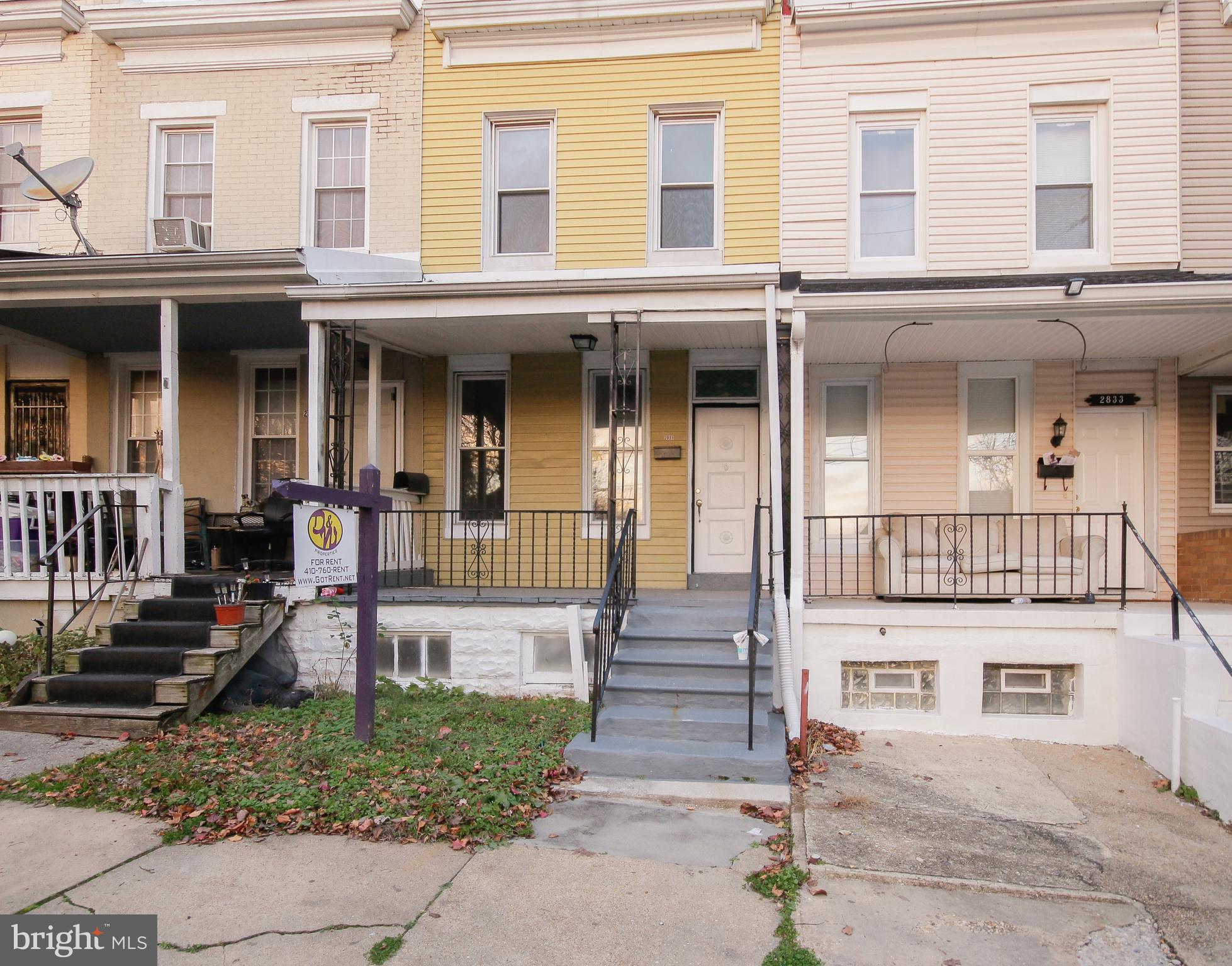 Nice rowhome on quiet street minutes from Downtown! Hardwood floors throughout, large living room and separate dining room, large eat in kitchen, new paint, washer and dryer, painted basement for storage, covered front porch and nice fenced in back yard. Minutes from downtown and walking distance to transportation. Water included in rent.