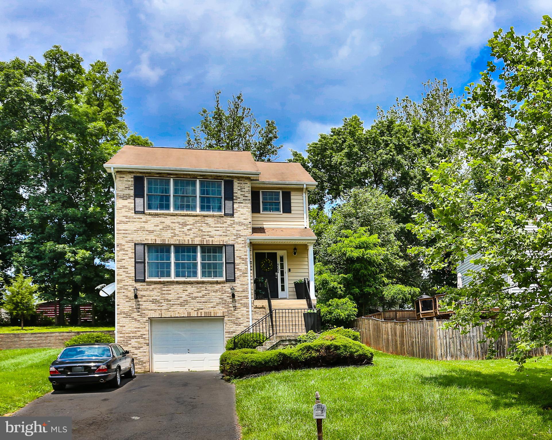 Welcome Home!

Tucked away on a quiet street just minutes from historic Manassas, this stunning home offers modern comfort while overlooking serene wooded views. Grand on the outside yet bright and cozy on the inside, it’s designed for both relaxation and entertaining.

To the left of the entrance, the formal sitting room is bathed in natural light from triple windows, seamlessly flowing into the elegant dining room, perfect for hosting dinner parties. The gourmet kitchen features modern soft-close cabinets, granite countertops, new range, newer stainless steel appliances, and a large pantry. Designed with an open concept, the kitchen connects effortlessly with the family room, ensuring you’re never left out of the conversation while cooking. Sliding glass doors lead to the deck, where you can enjoy your morning coffee under the shade of a retractable awning while watching colorful birds visit year-round. A side door from the kitchen allows for an extension into a wraparound deck. The main level also includes a conveniently located washer and dryer, and the home features dual-zone heating and air for year-round comfort.

Upstairs, three spacious bedrooms offer ample closet space. The primary suite is a peaceful retreat, with triple windows overlooking the wooded scenery. The spa-like ensuite bathroom invites relaxation, while the expansive walk-in closet provides plenty of room for even the biggest fashion enthusiast.

The fully finished, walk-out basement is a versatile space, complete with recessed lighting, an egress window, and a full bathroom. Whether used as a guest suite, rec room, gym, home office, or play area, it adapts to your lifestyle needs. The oversized garage can be accessed directly from the basement, adding even more convenience.

New roof and new washer and dryer complete this beautiful home. 

Located just minutes from Old Town Manassas, this home offers endless options for dining, shopping, and entertainment. Farmers markets, music festivals, opera, ice skating, museums, an art center, and a variety of shops, cafés, and restaurants are all within easy reach. Commuters will love proximity to the VRE station for easy access to Washington D.C. The town is also serviced by Omniride buses with routes throughout Northern Virginia, and major roads such as I-66, Route 28, and Route 234 provide quick access to the Tech Corridor, Dulles International Airport, and Quantico MCB.

This home seamlessly blends tranquility, modern convenience, and vibrant city life—don’t miss your chance to make it yours!
