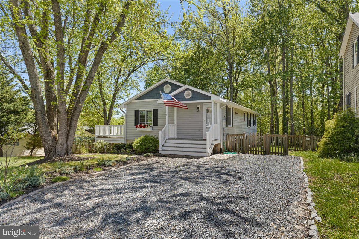 This home is a breath of fresh air! Recently remodeled, you will enjoy the open kitchen plan that adjoins the great room.. There is a wonderful side deck  looking out to your very large fenced back yard. This yard is just what you are looking for for your children, grand  children and pets! The primary suite has it's own private bath and the other two bedrooms share a lovely hall bath.  But wait, there is more! The entire lower level is finished!  A huge space for a recreation room, a 4th bedroom, business in  your home, theater room or what ever you want!  This level features a walk out door to the fenced yard.  INVESTMENT ALERT:  You could use the lower level with it's private entrance for another family member's home. Just add another bath and kitchen area.  Could be income producing .  Another great feature  is that it is on a corner lot and there is lots of extra parking  along the side yard  in addition to parking right by the entrance.  This home is an unexpected find in the North Beach area and is suitable for so many different lifestyles. Just a few blocks to the North Beach boardwalk, restaurants, shopping  and so much more!
