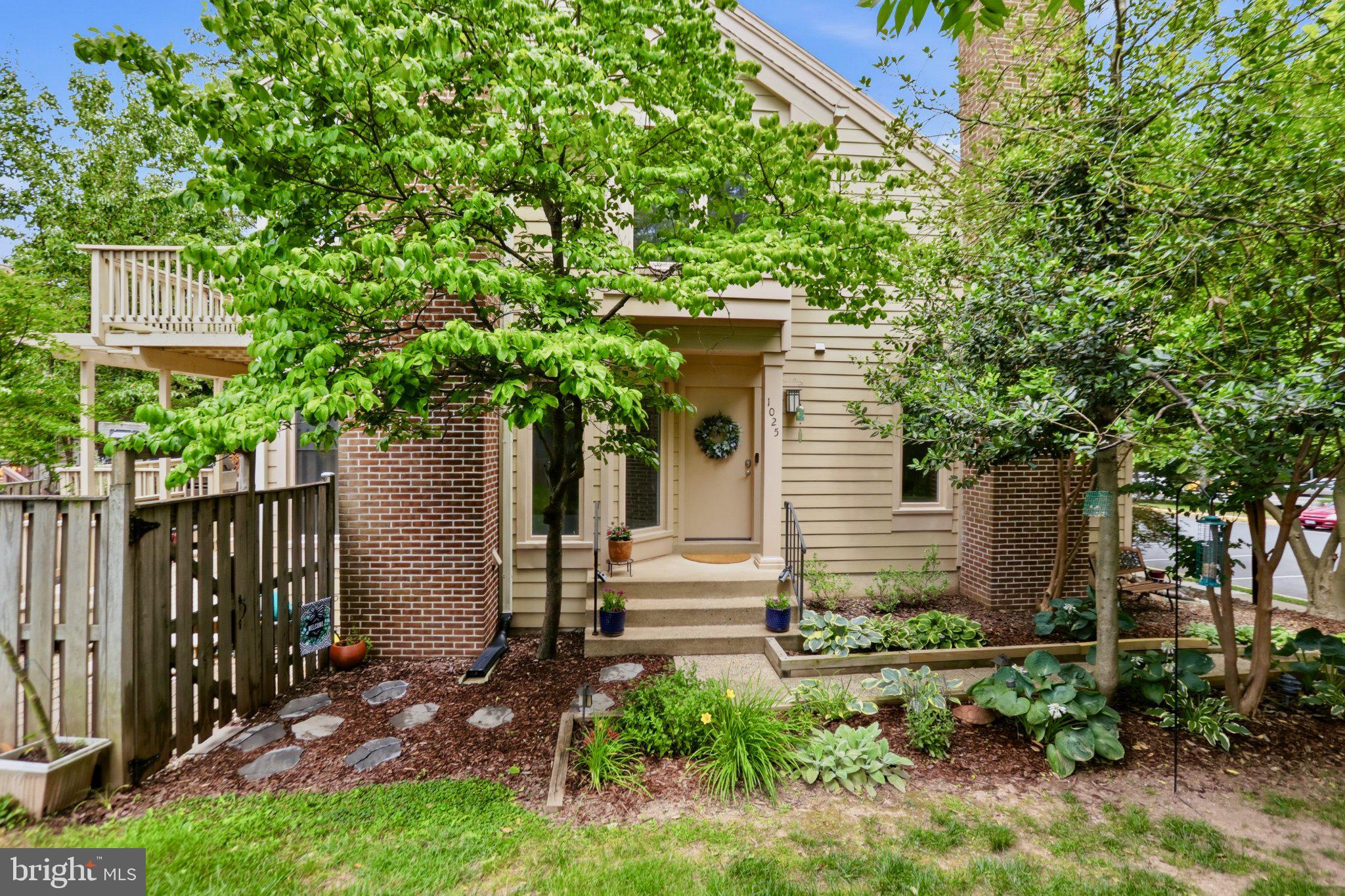 Welcome to 1025 Boros Ct — a remarkably updated end-unit townhome in the heart of Herndon presenting exceptional living space both inside and out.
This spacious end unit offers exceptional privacy and a fully fenced backyard with an extensive, double tier deck — perfect for hosting your friends or decompressing from your busy life. The living room, complete with fireplace and vaulted ceiling, and the kitchen and dining room, all integrate perfectly to create an inviting and comfortable space with easy access to the deck and backyard via two new sliding glass doors. It's the perfect setup for a 4th of July party with an exceptional view of the Town of Herndon's fireworks display right from your own backyard.
The updated kitchen (2019) features hardwood floors, modern shaker cabinetry, and stainless steel appliances including a new refrigerator (2025), range (2024), and matching stainless hood. Granite countertops arranged throughout the kitchen provide you with an abundance of premium surface space. Hardwood floors continue into the dining room, and brand new carpet flows throughout the rest of the home. A main level office with its own fireplace offers the ideal level of sophistication and versatility. Upstairs, the renovated primary bathroom (2021) was built to impress, with a wide dual sink vanity, soaking tub, and frameless glass shower.
Major systems and exterior have been thoughtfully updated: HardiPlank siding (2012), roof (2012), and water heater (2024) give buyers confidence from day one. Two assigned parking spaces plus ample open parking complete the package.
All of this in an unbeatable location — walk to the W&OD Trail, Bready Park, Herndon Community Center, Herndon Centennial Golf Course, and vibrant Downtown Herndon. Easy access to Route 28, the Dulles corridor, and Reston Town Center puts everything Northern Virginia has to offer within minutes. This home is the perfect investment for your lifestyle and your future.